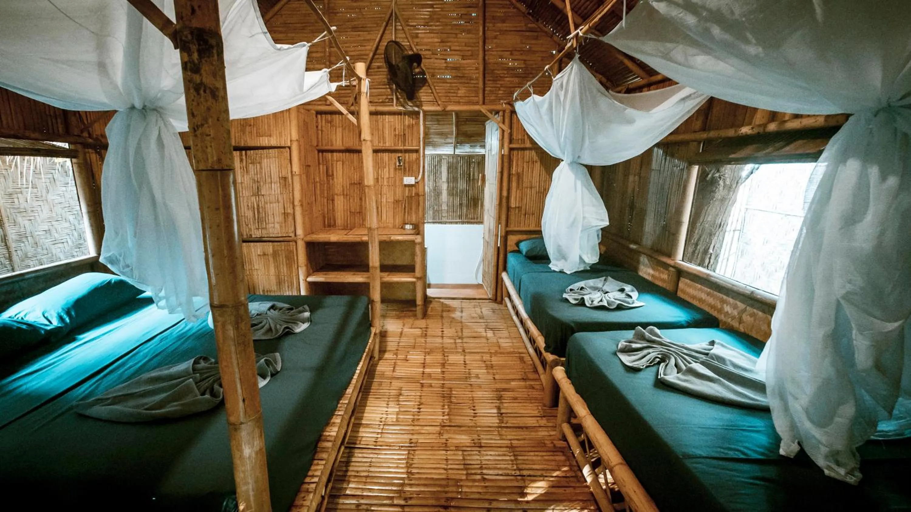 Bed in Green View Beach Resort