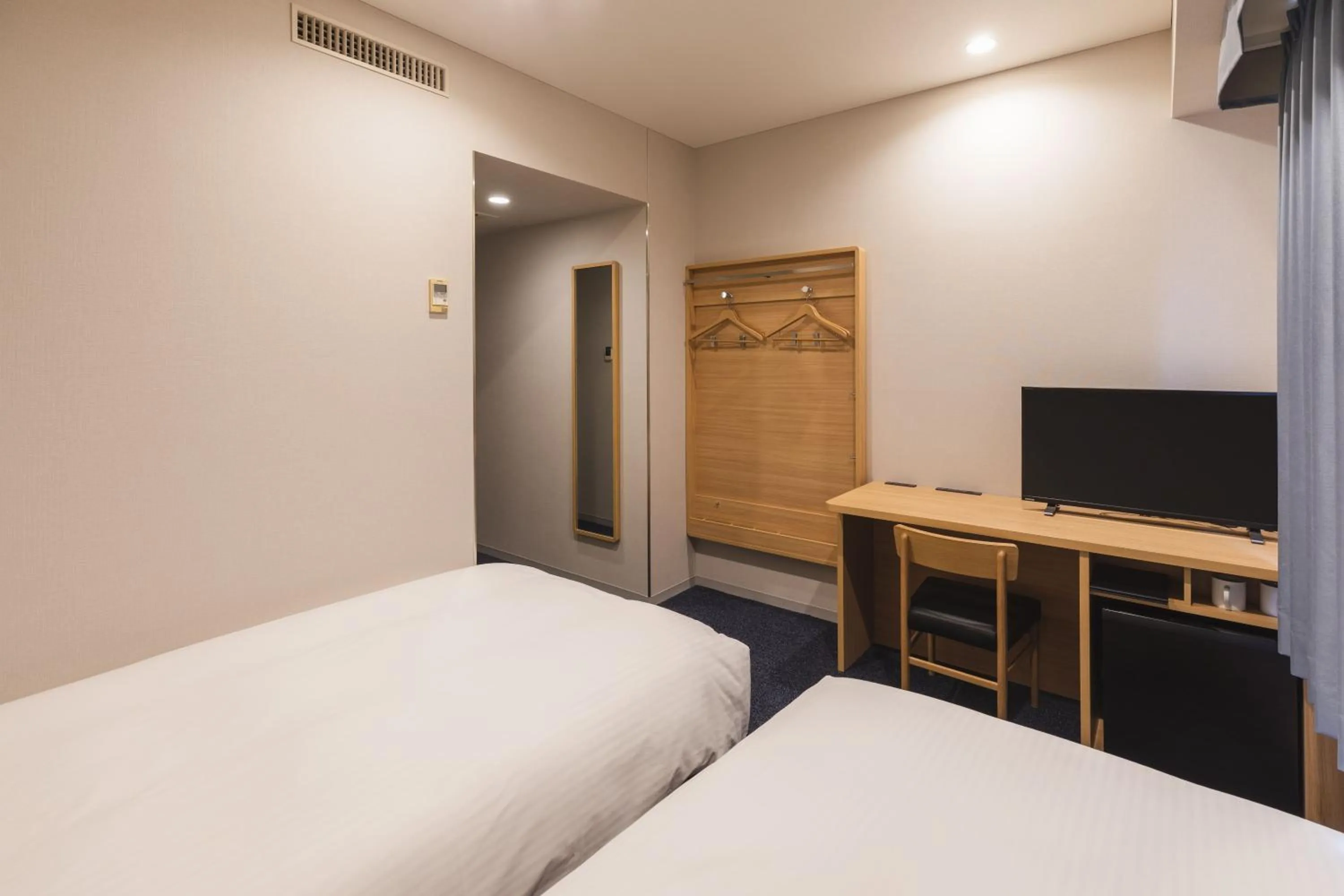 Bed in Sotetsu Fresa Inn Tokyo-Akasaka