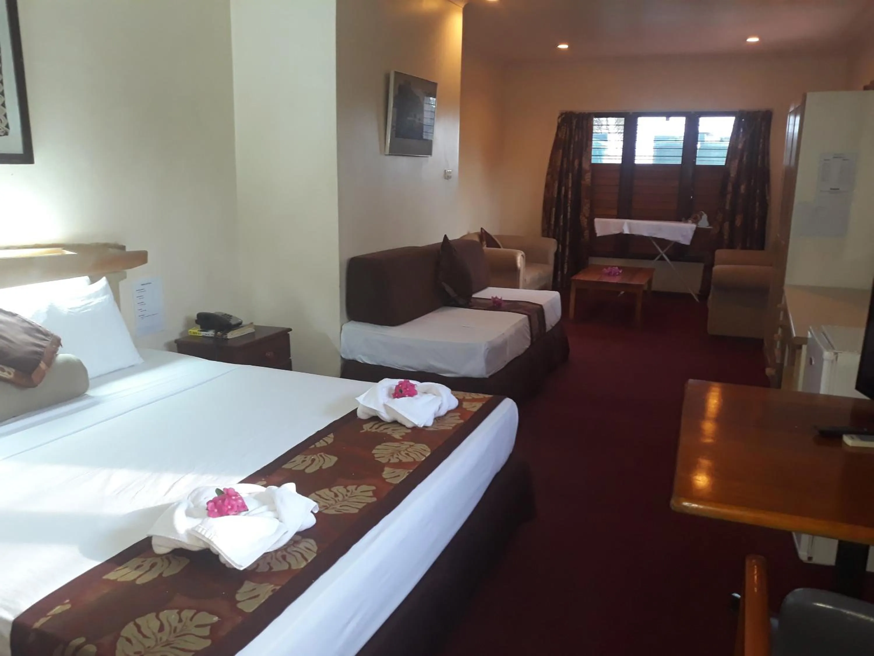 Photo of the whole room, Bed in Grand Eastern Hotel