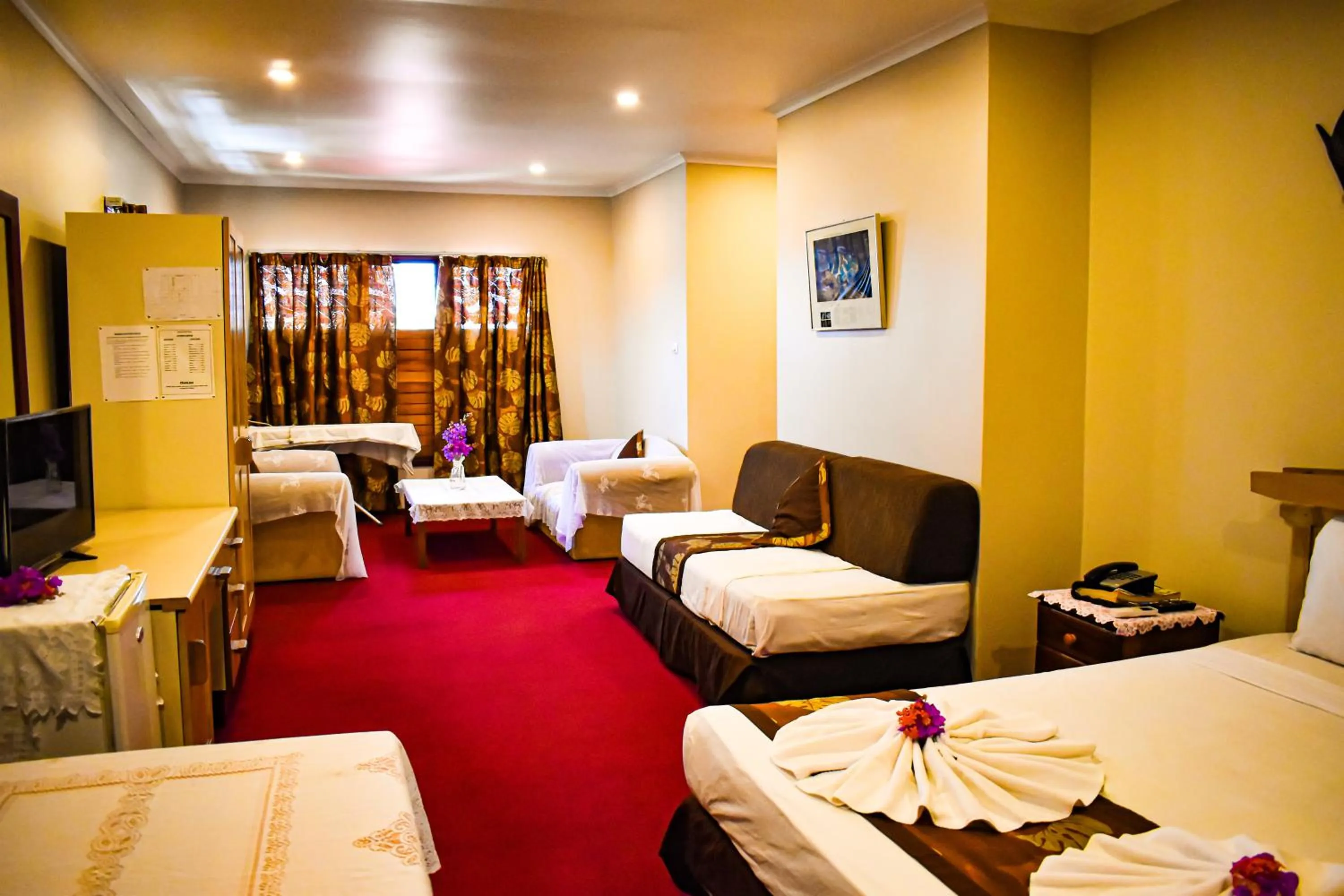 Photo of the whole room, Bed in Grand Eastern Hotel