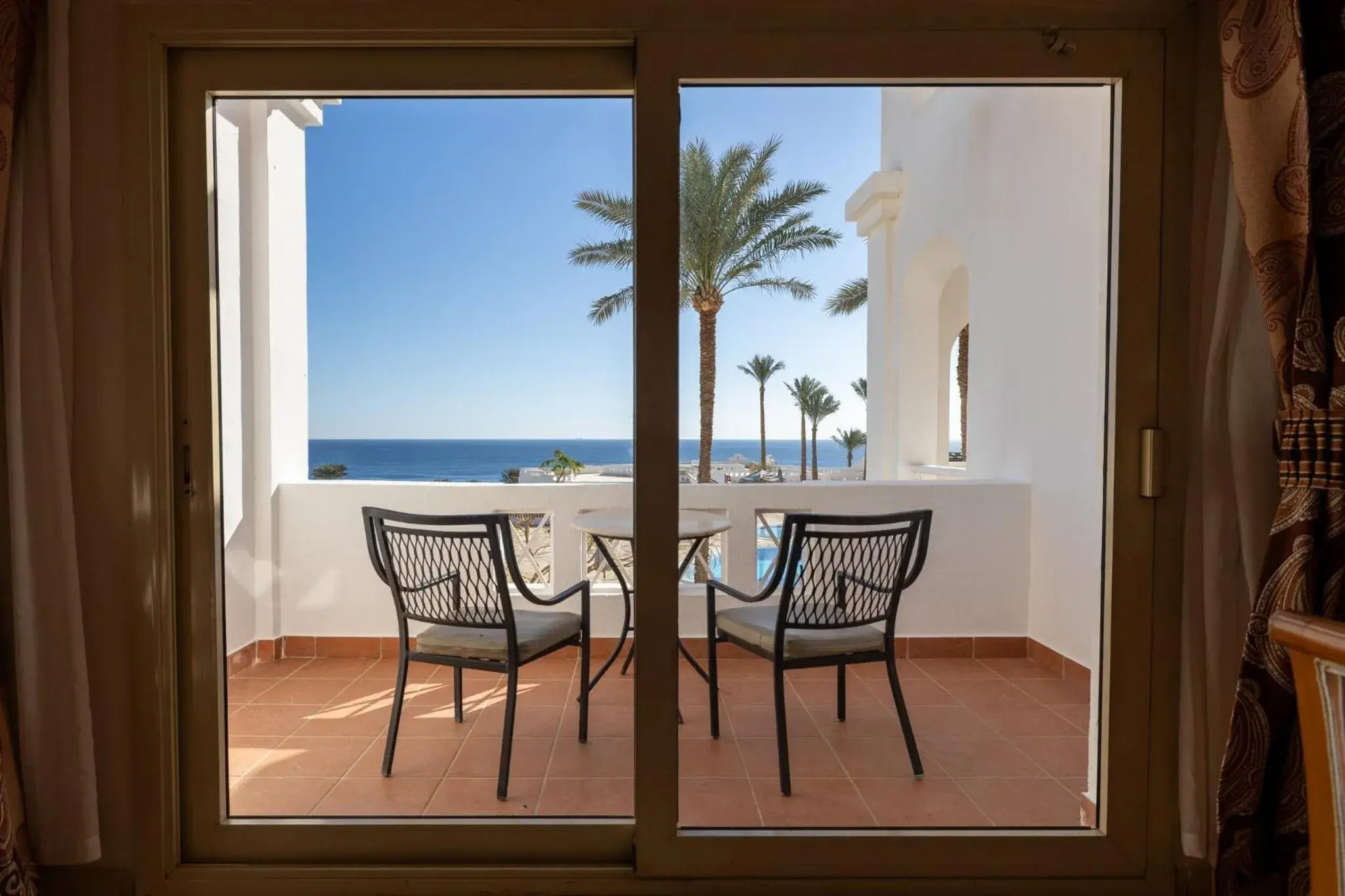 One-Bedroom Suite with Seafront and Balcony in Continental Plaza Beach Resort One-Bedroom Suite with Seafront and Balcony in Continental Plaza Beach Resort