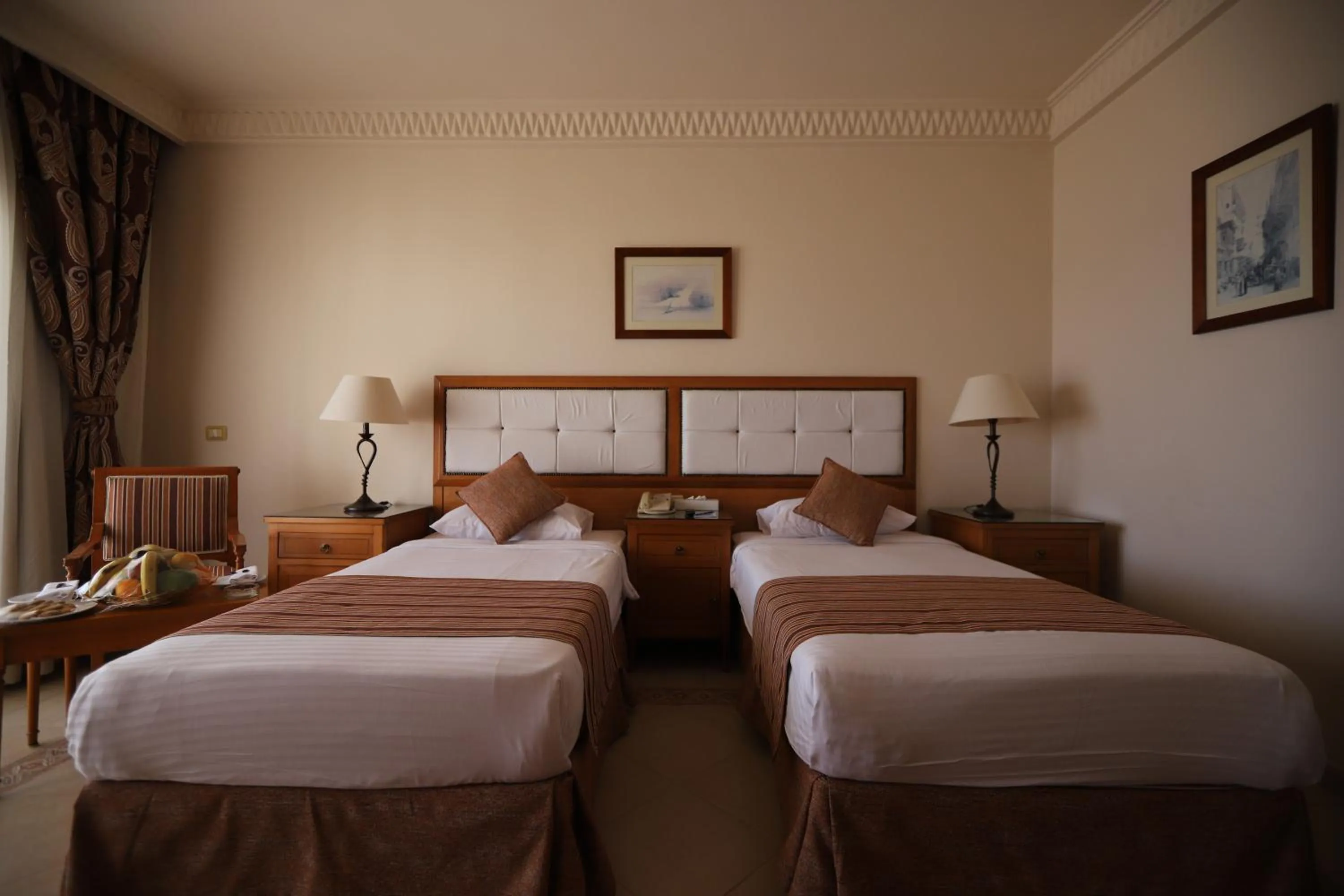 Photo of the whole room, Bed in Continental Plaza Beach Resort