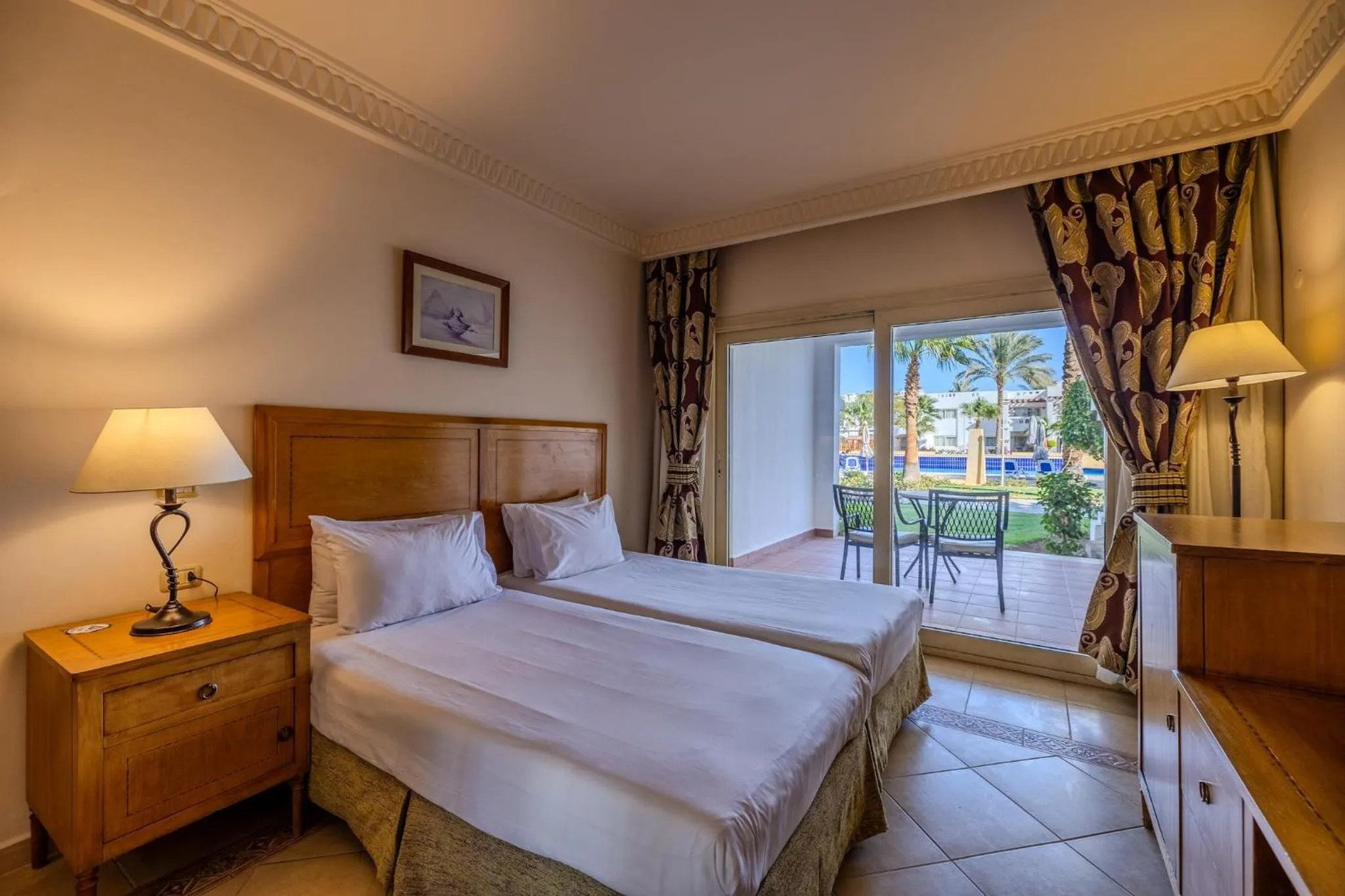 Photo of the whole room, Bed in Continental Plaza Beach Resort