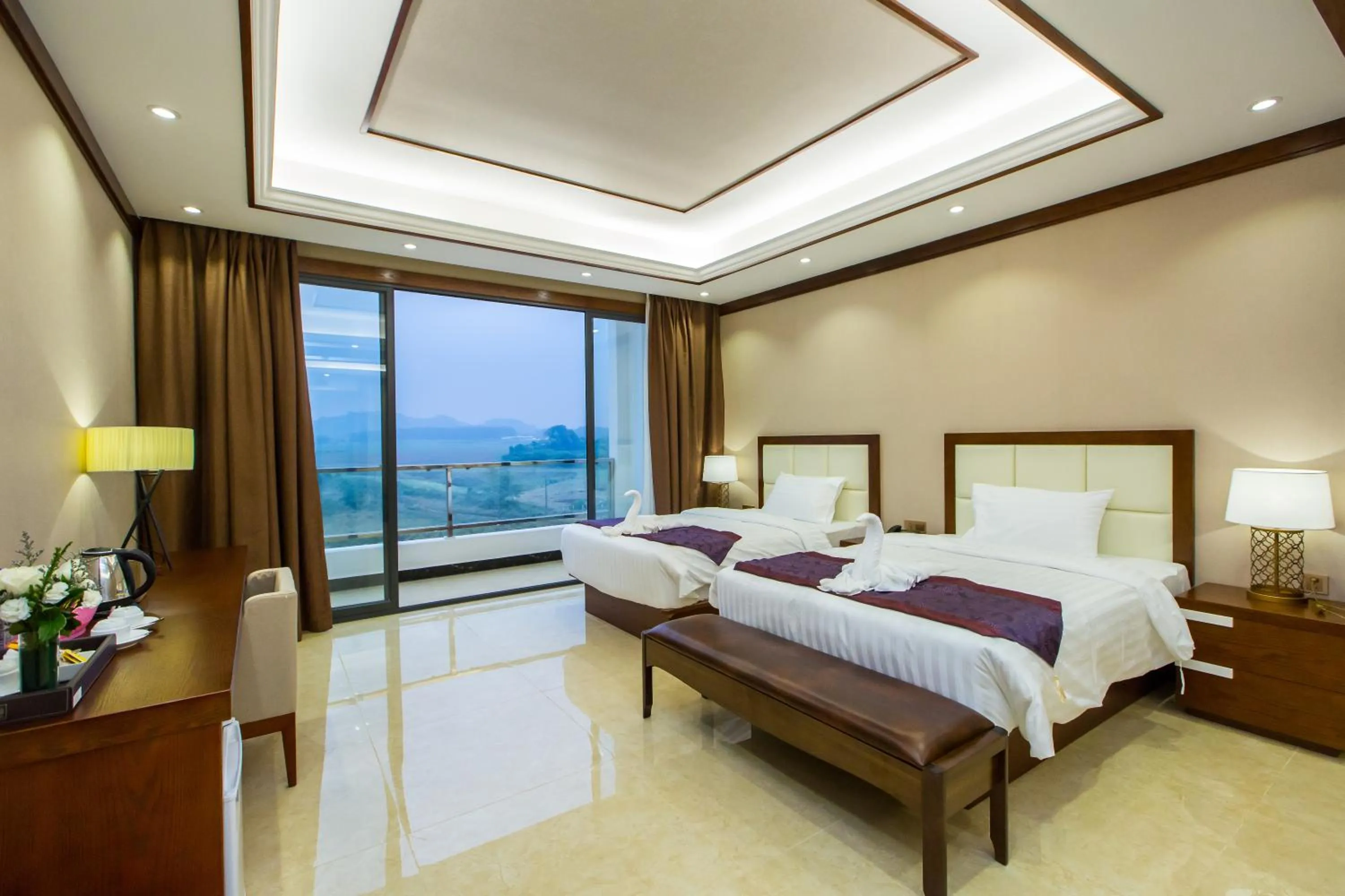 Bed in Paksong Danngarm Hotel