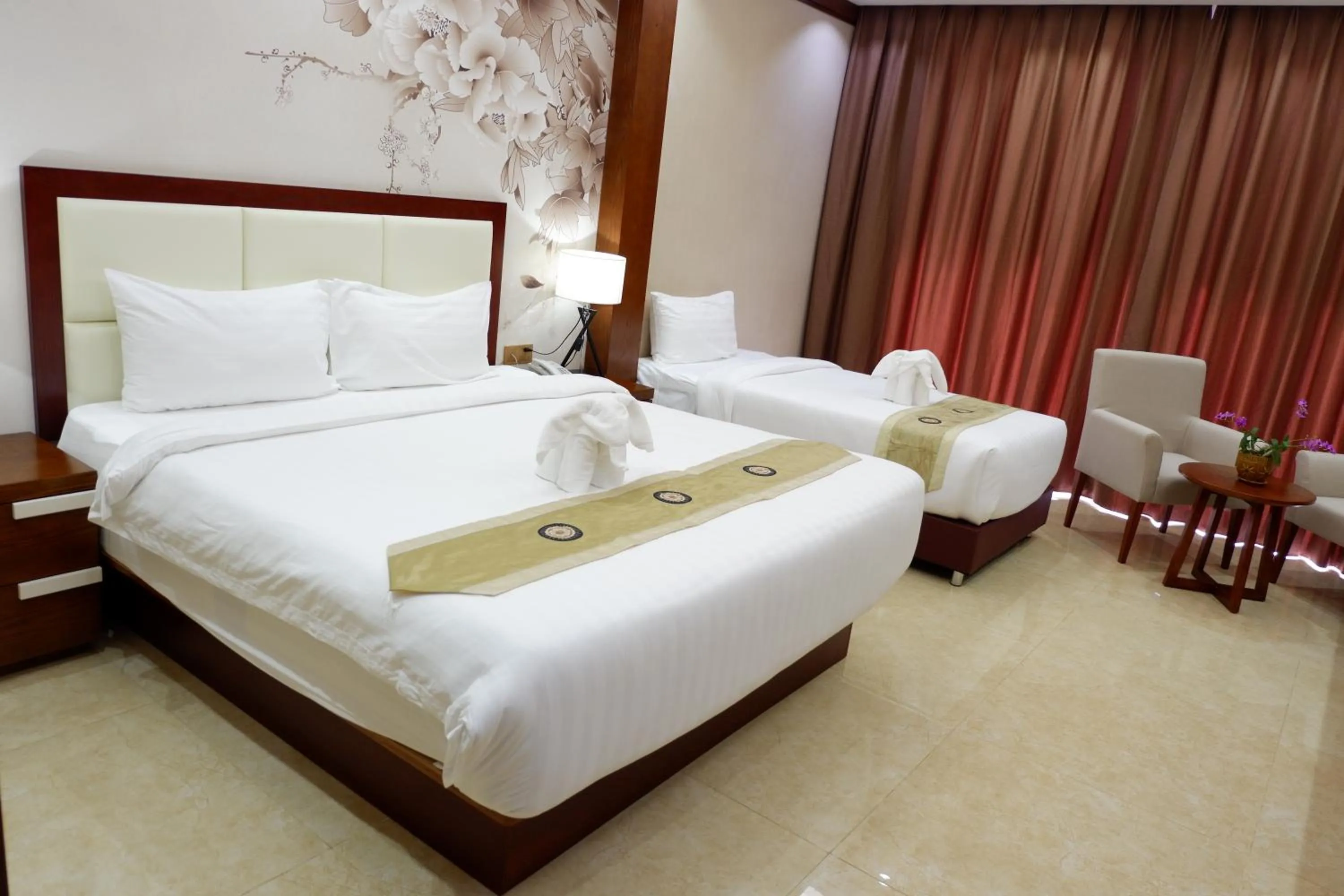 Bed in Paksong Danngarm Hotel
