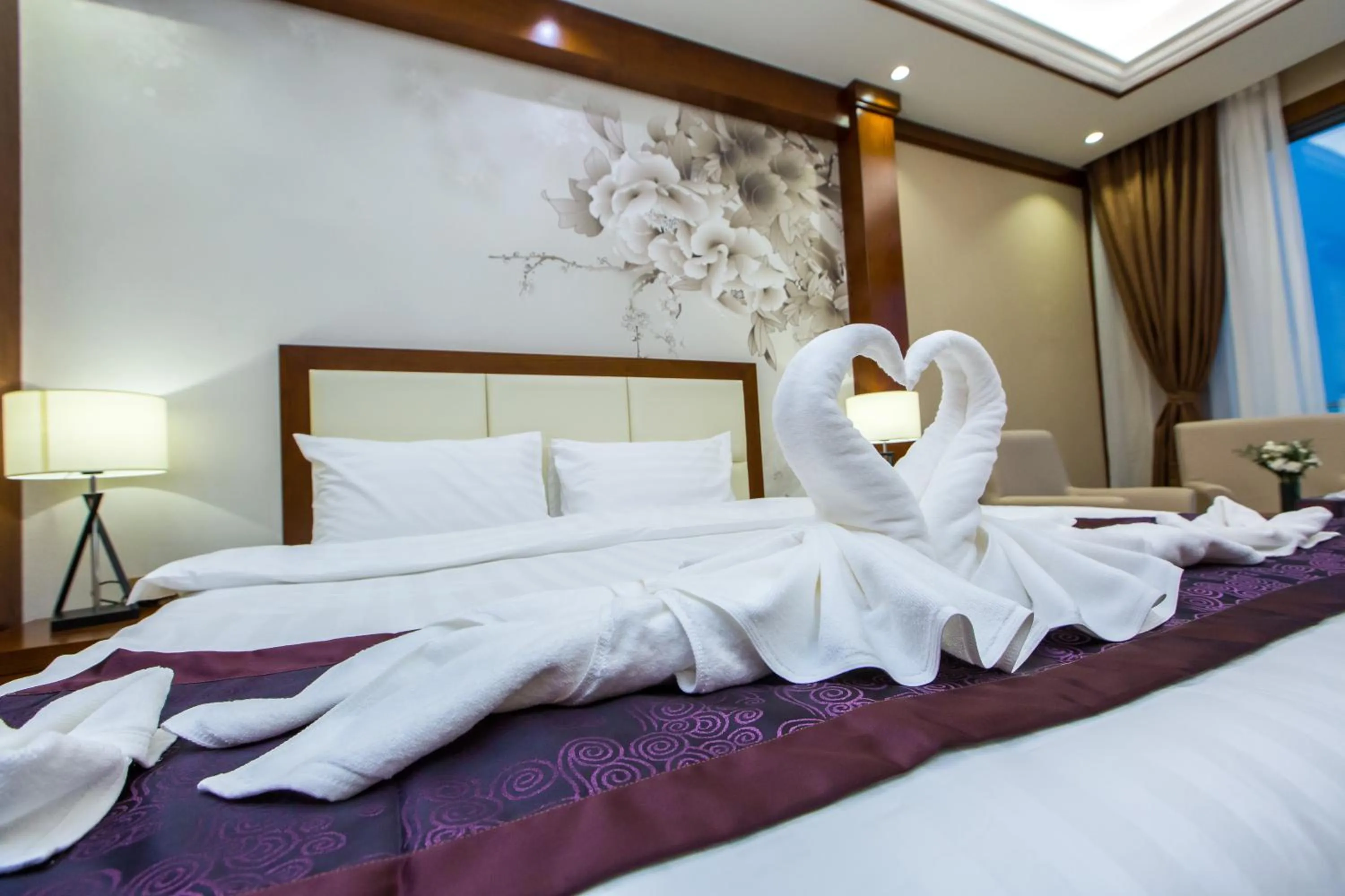 Bed in Paksong Danngarm Hotel