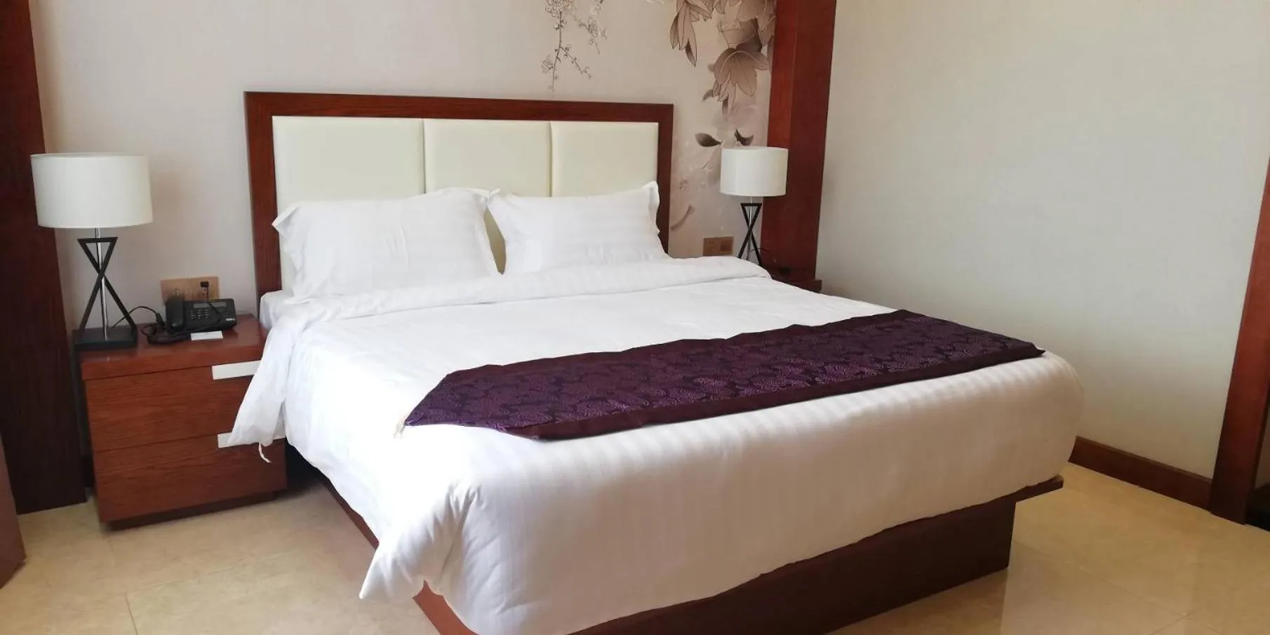 Bed in Paksong Danngarm Hotel