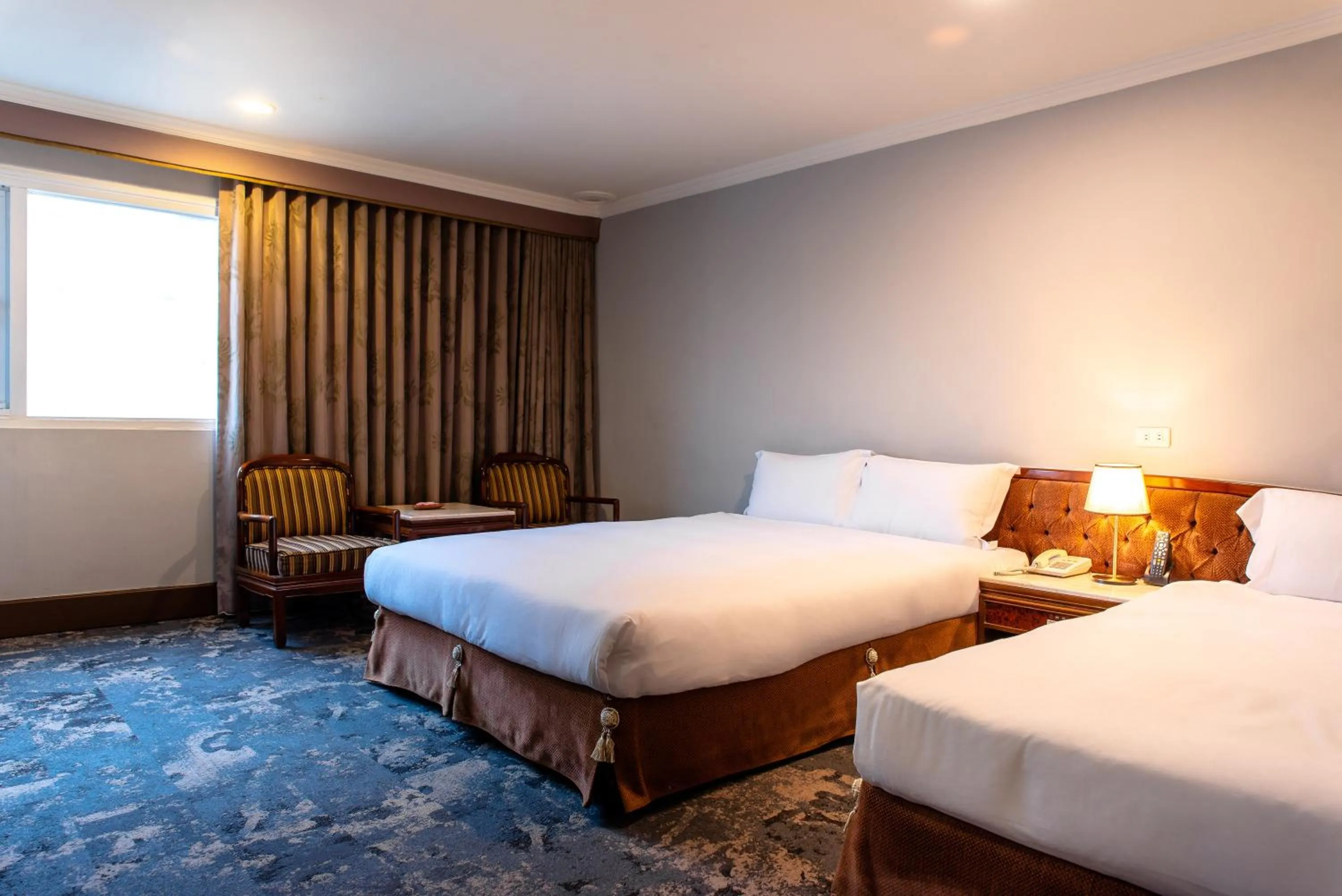 Bed in Chiayi King Hotel