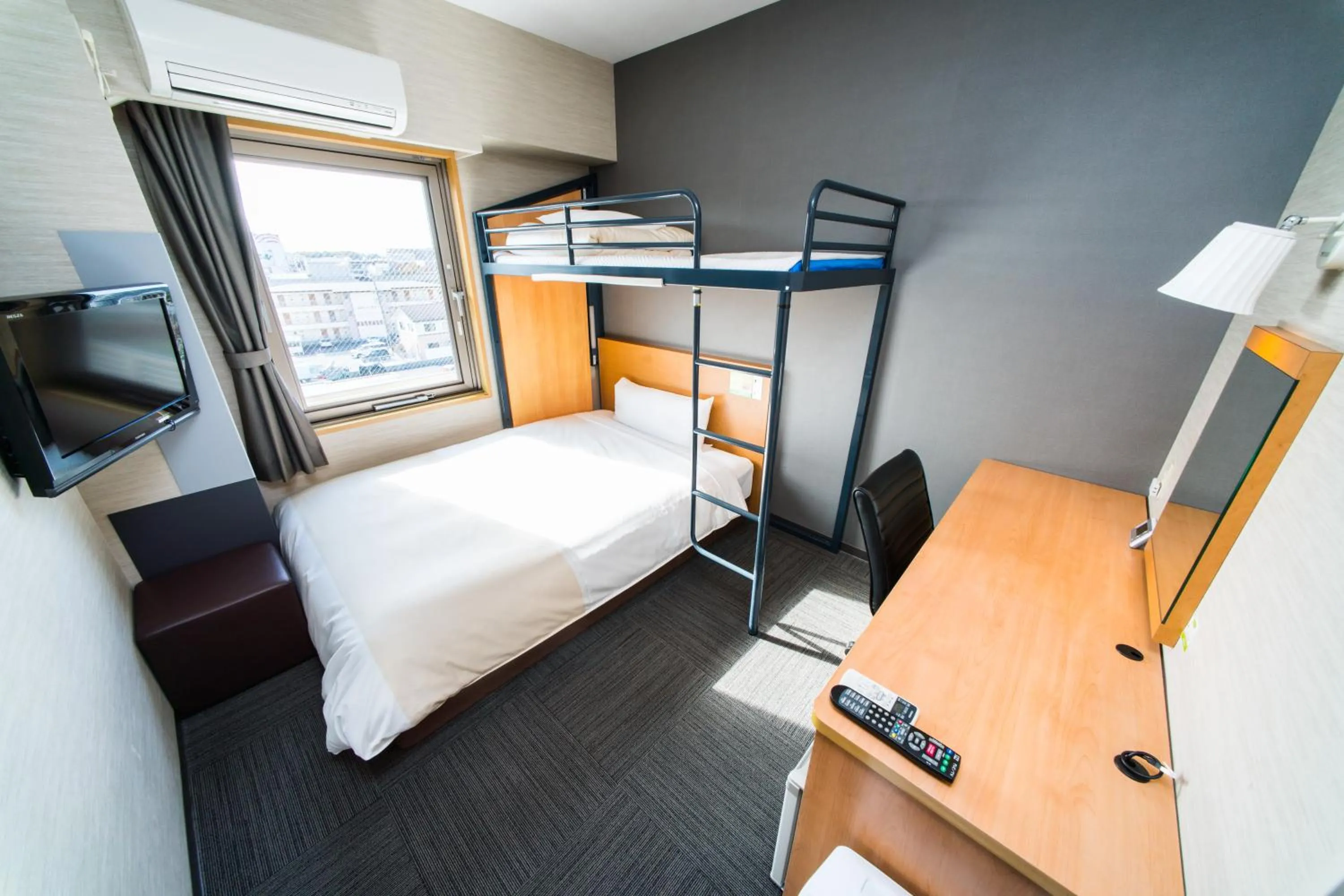 Bed in Super Hotel Minami Hikone Ekimae