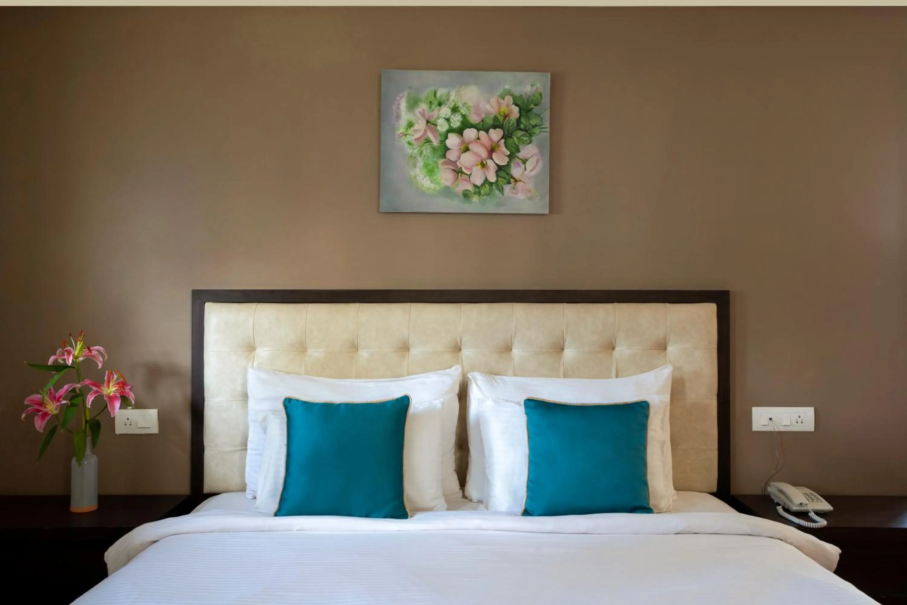 Bed in Ziva Suites - A Botique Hotel