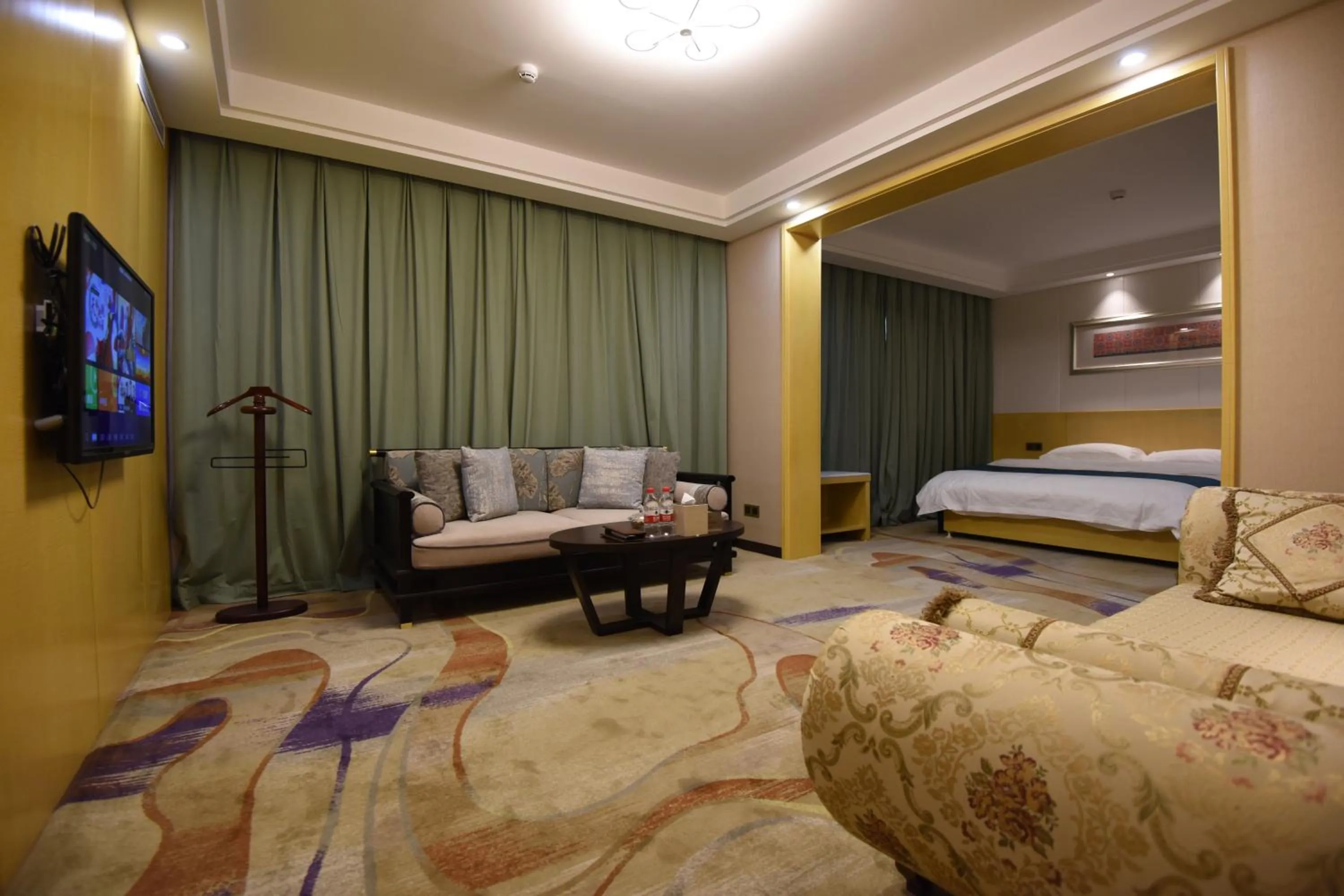 Living room, Bed in Dunhuang Hotel