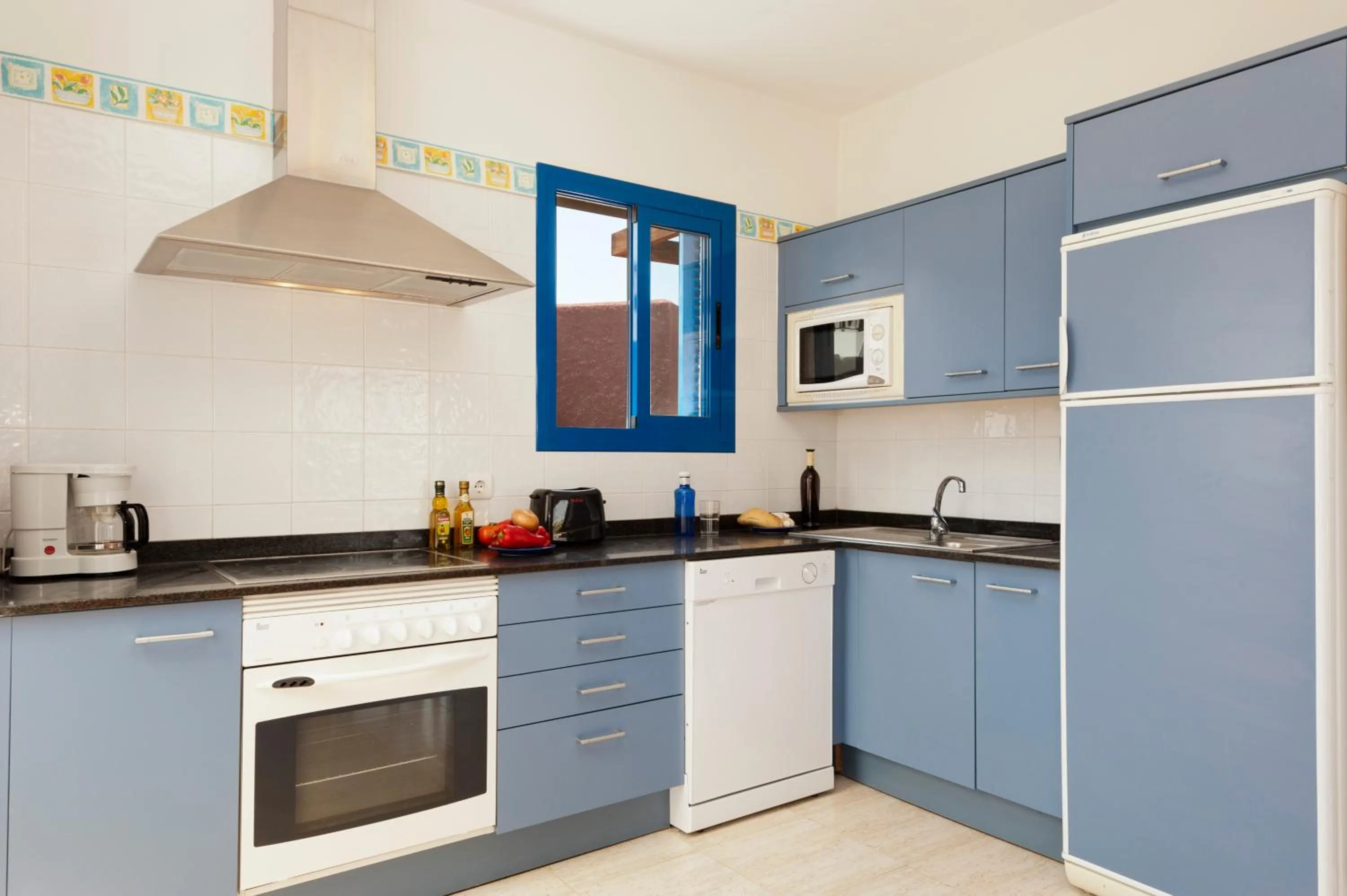 Kitchen or kitchenette in Villas Las Marinas