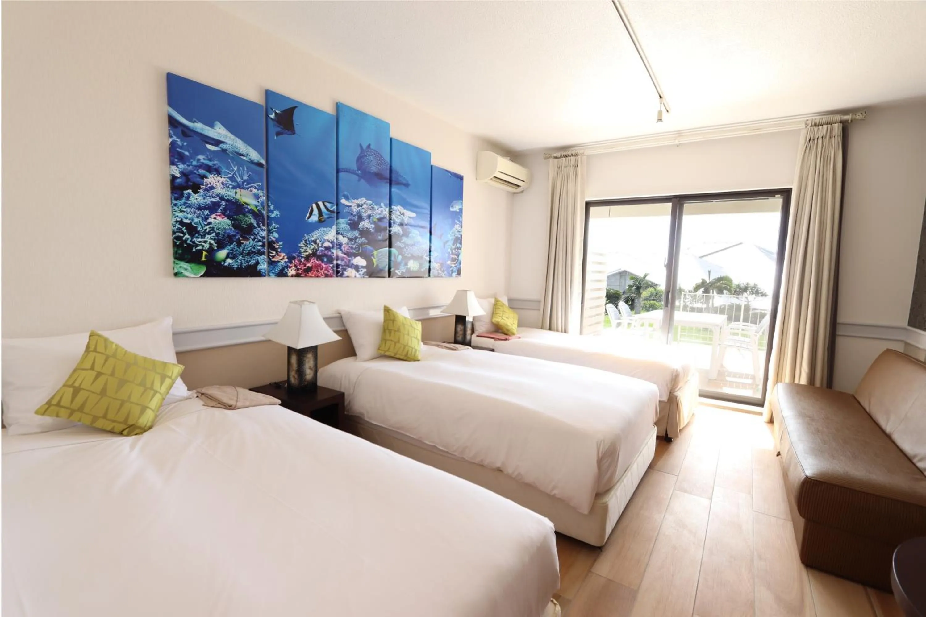 Photo of the whole room, Bed in Royal View Hotel Churaumi