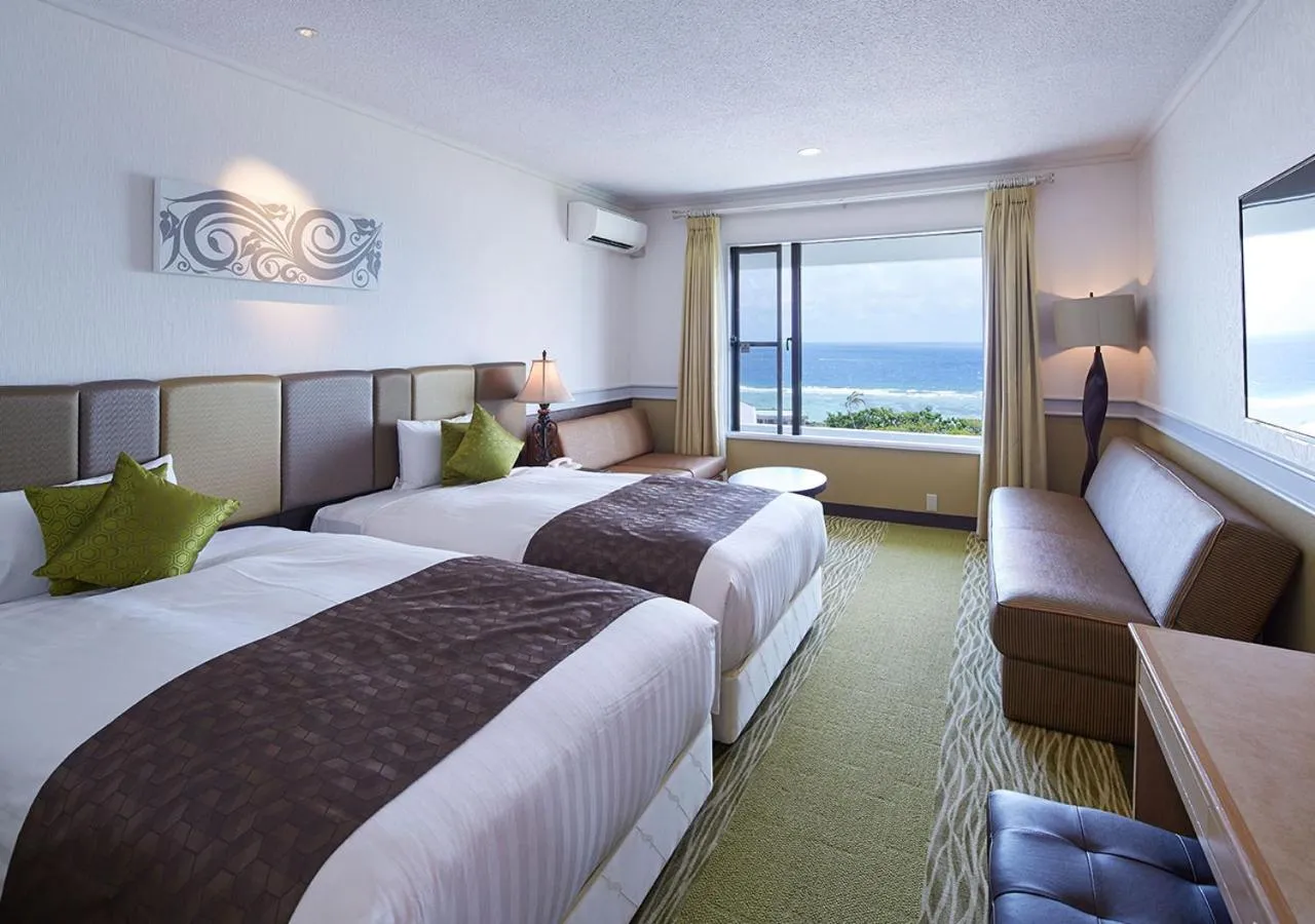 Photo of the whole room, Bed in Royal View Hotel Churaumi