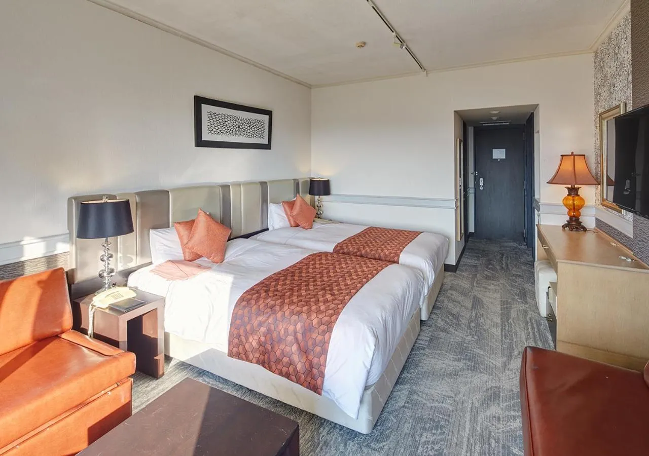 Photo of the whole room, Bed in Royal View Hotel Churaumi