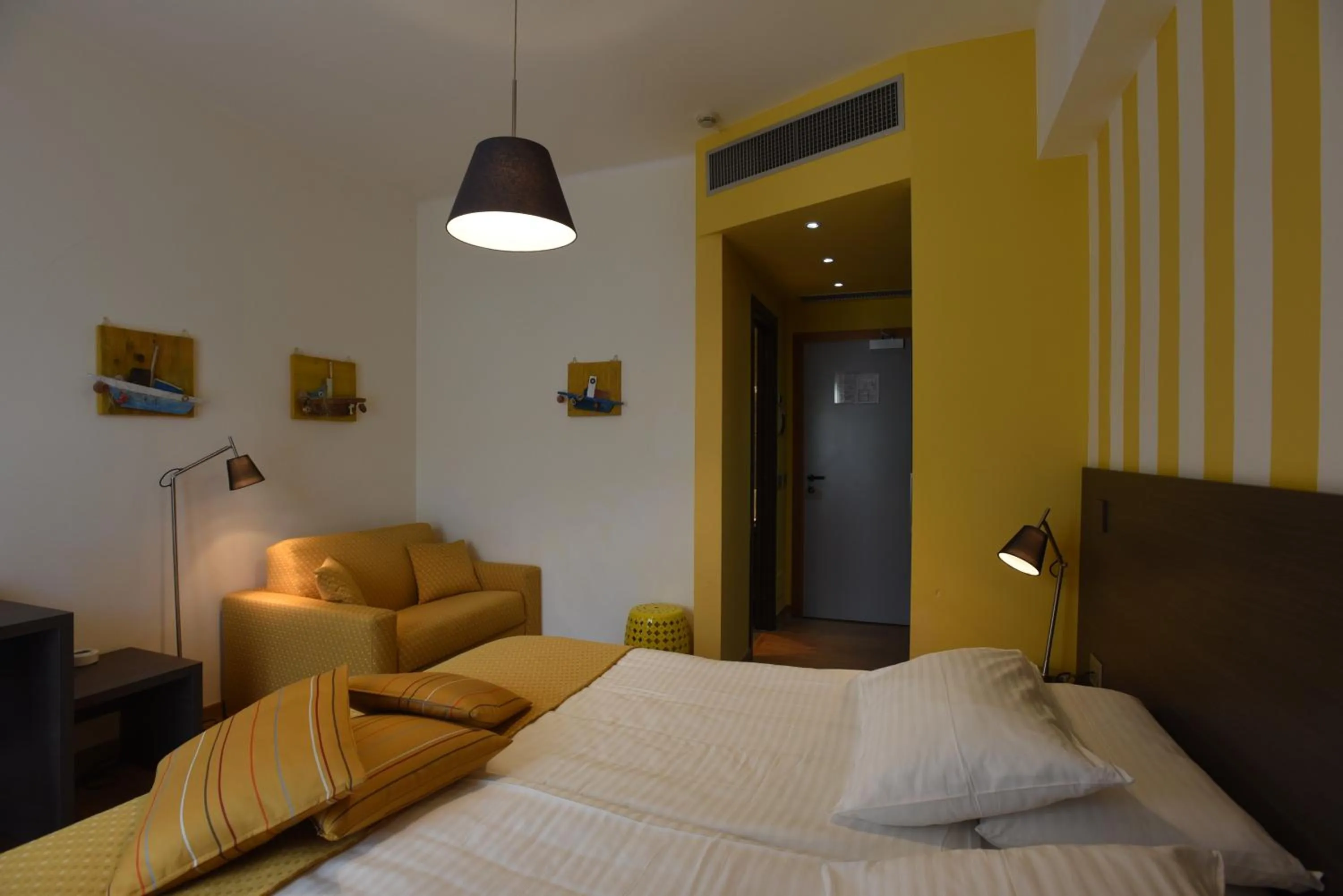 Bedroom in Hotel La Vigna