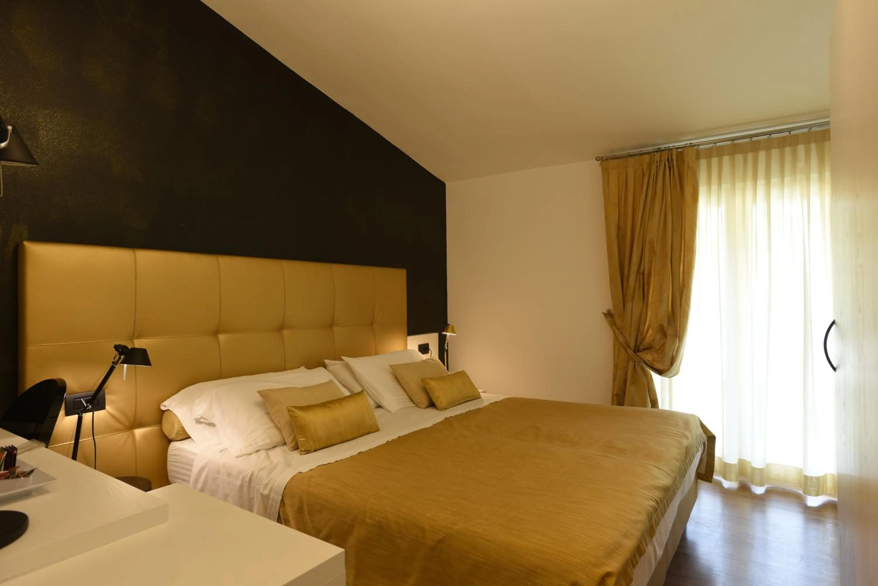 Bedroom in Hotel La Vigna