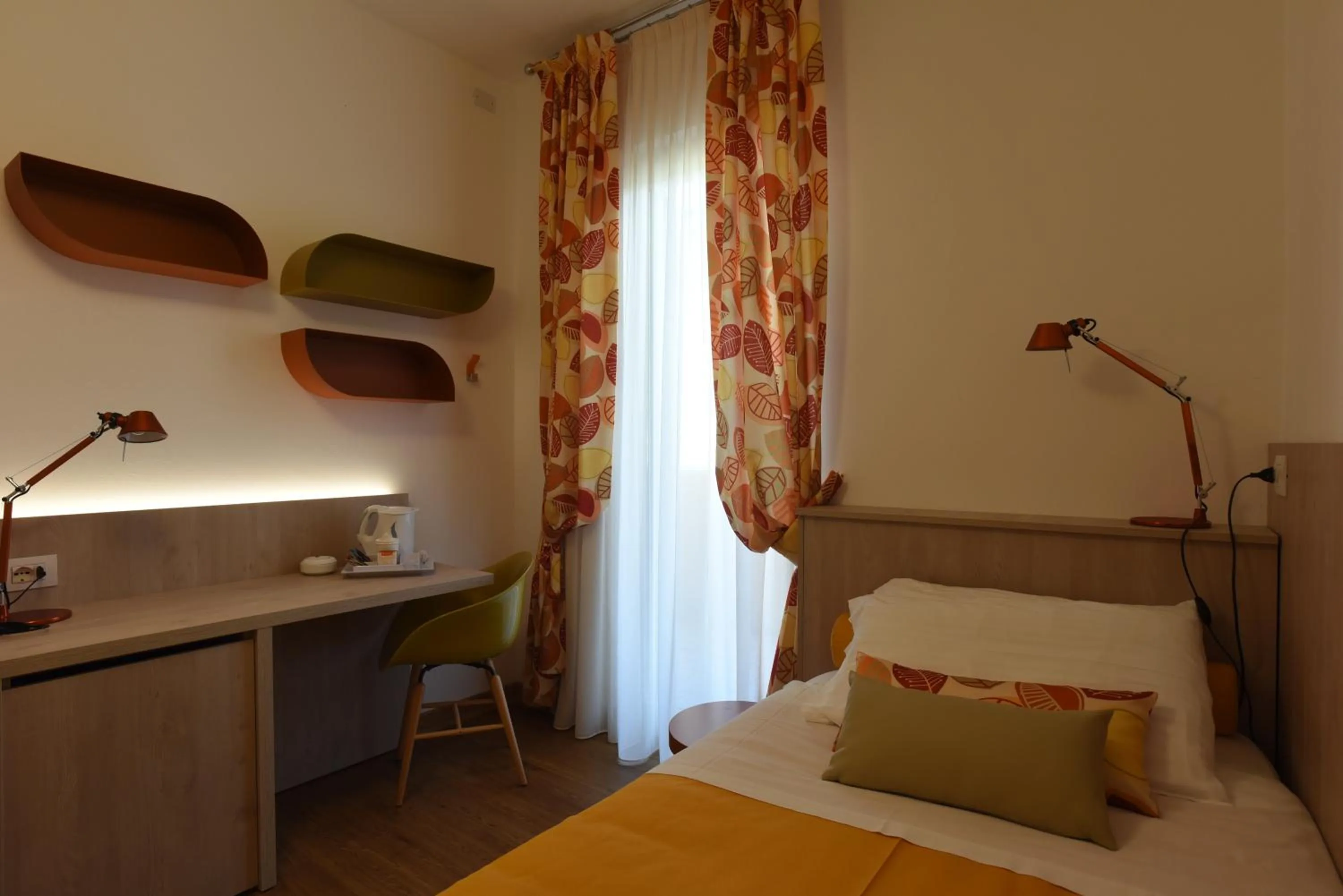 Bedroom in Hotel La Vigna