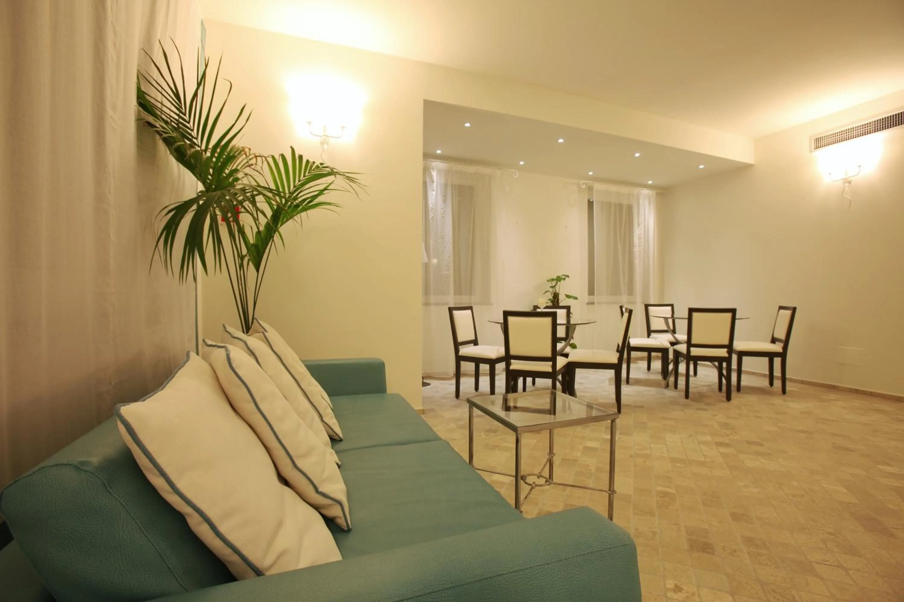 Communal lounge/ TV room in Hotel Mea - Aeolian Charme