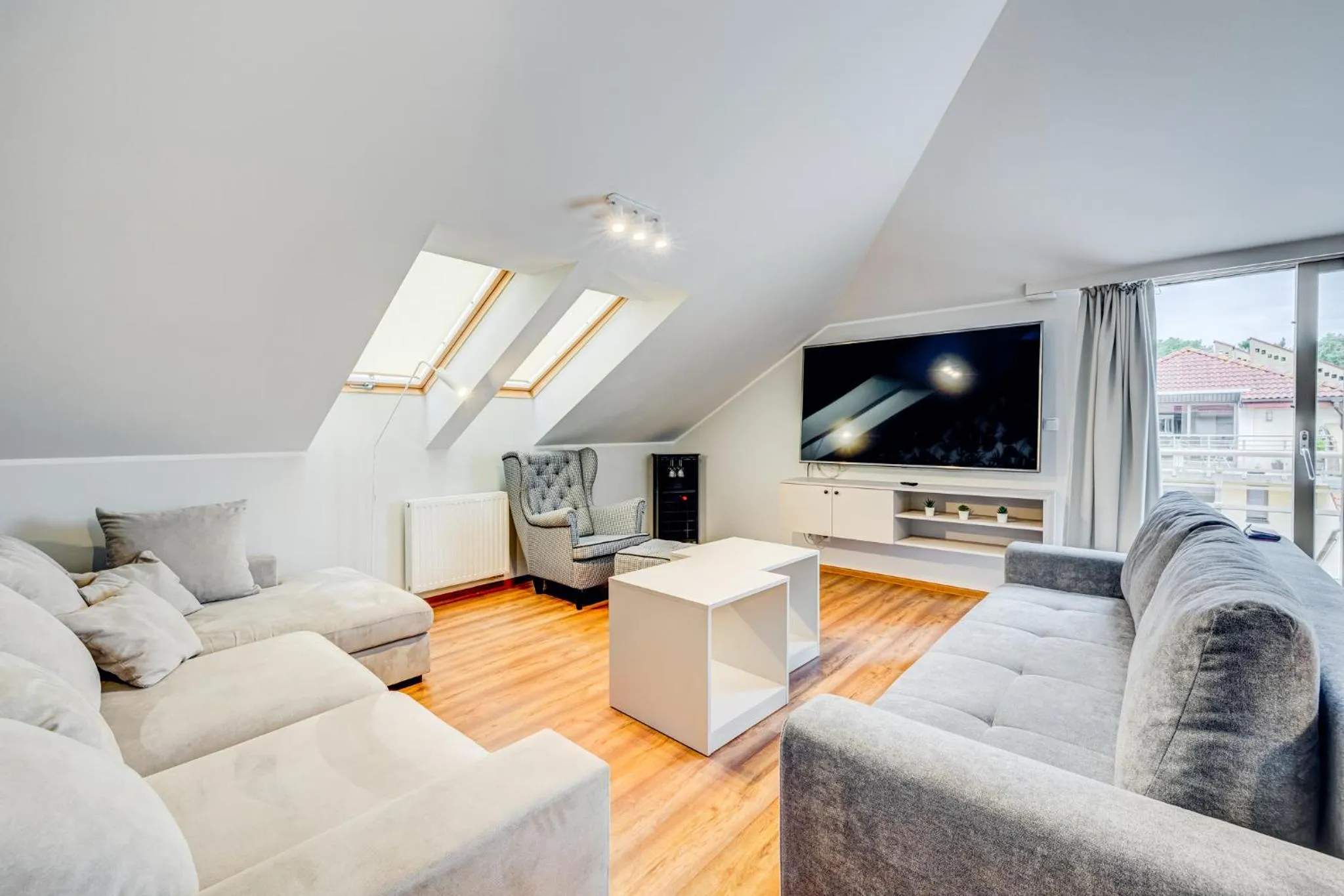 Communal lounge/ TV room in Apartamenty Zdrojowa