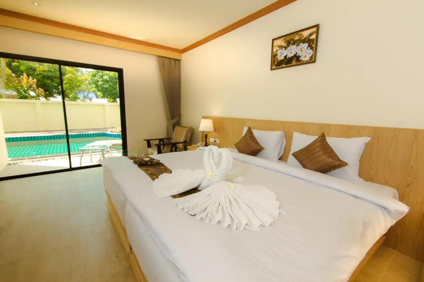 Deluxe Double or Twin Room with Pool Access in Airport Beach Hotel Phuket Deluxe Double or Twin Room with Pool Access in Airport Beach Hotel Phuket