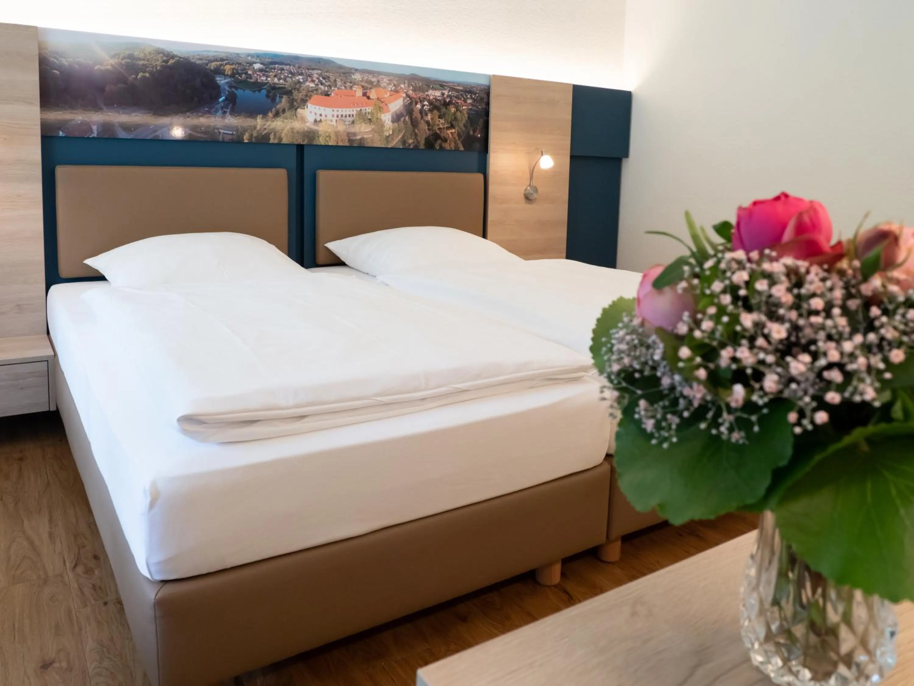 Photo of the whole room, Bed in Waldhotel Felsenkeller