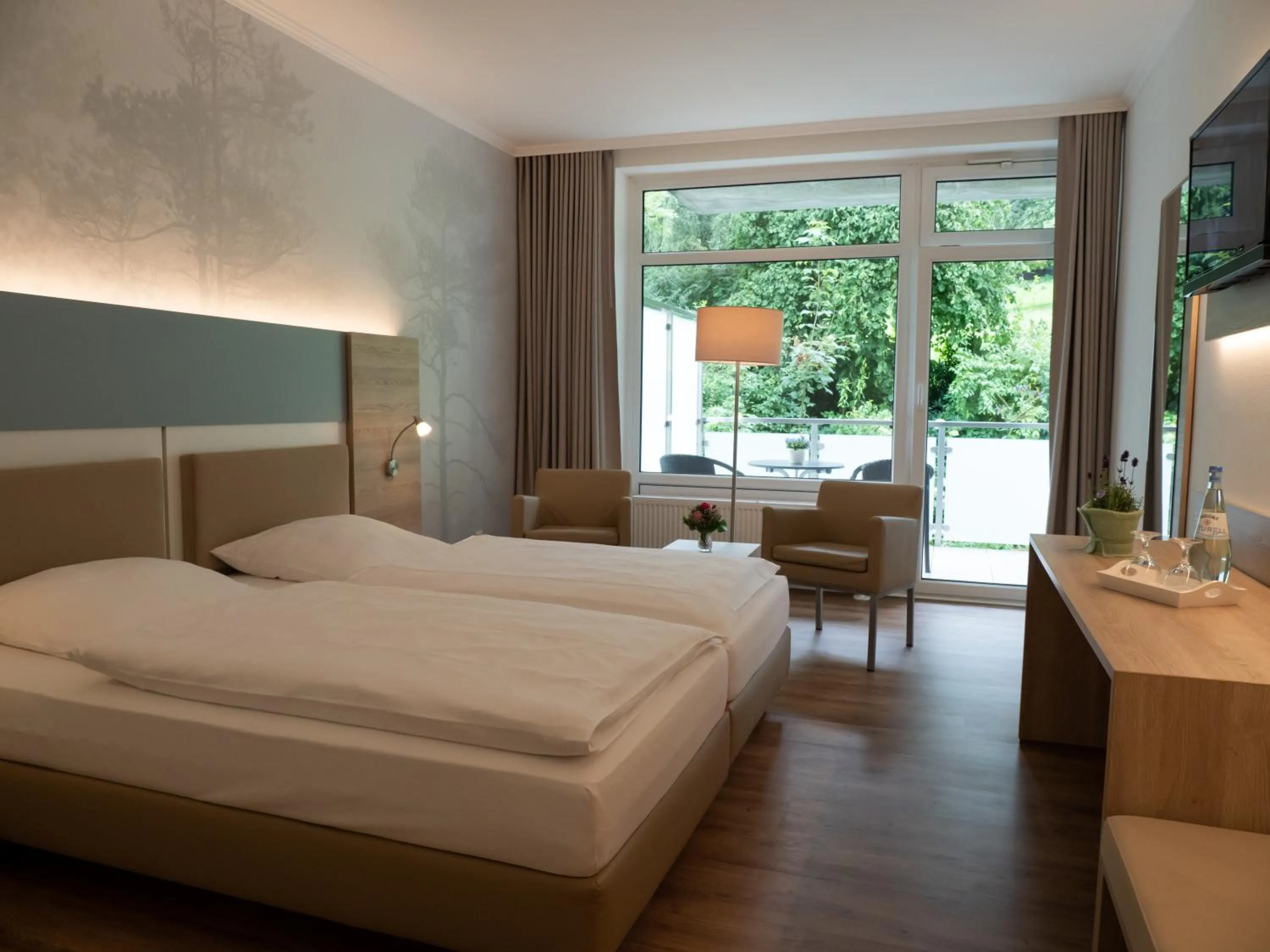 Photo of the whole room, Bed in Waldhotel Felsenkeller
