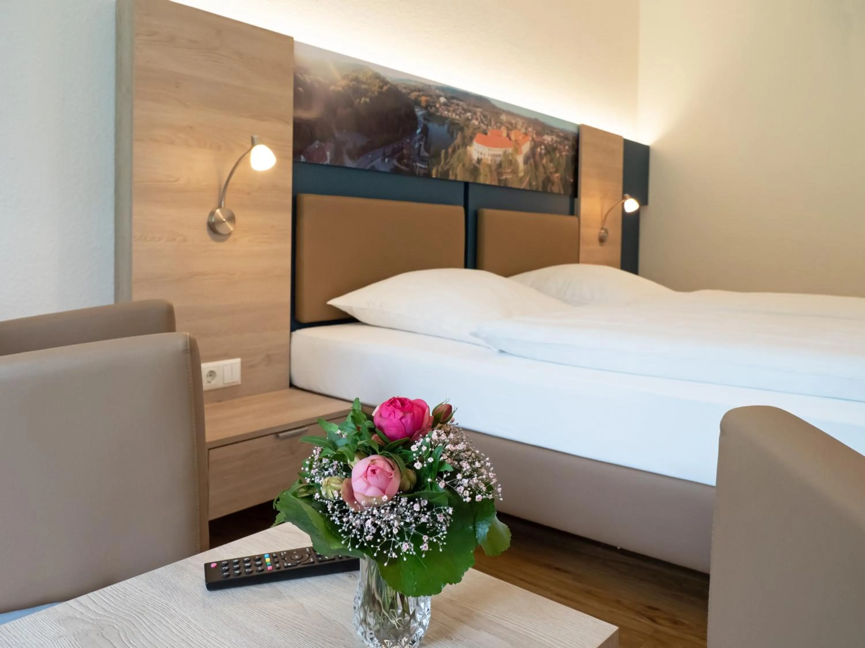 Photo of the whole room, Bed in Waldhotel Felsenkeller