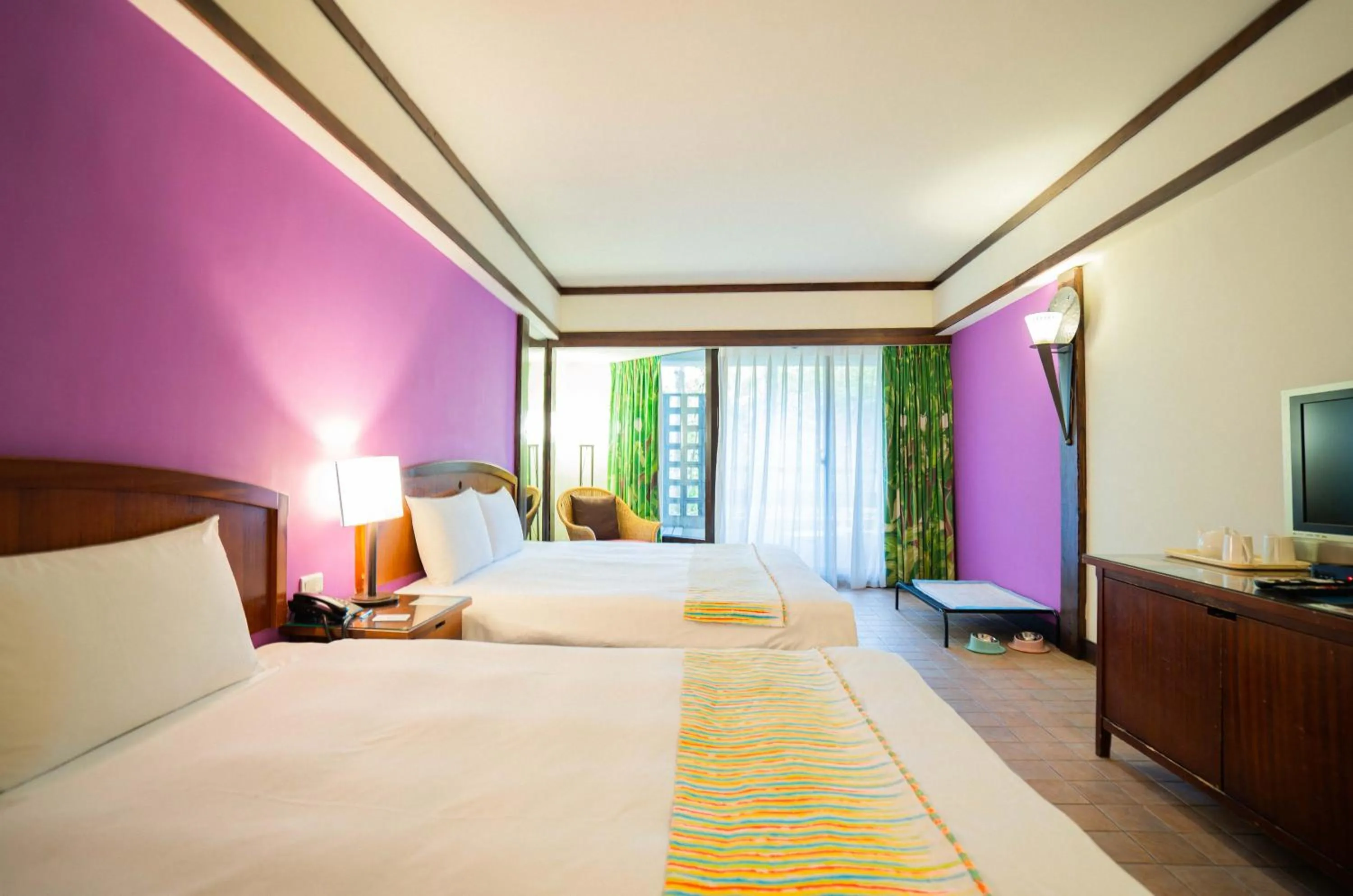 Photo of the whole room, Bed in Yoho Beach Resort Kenting