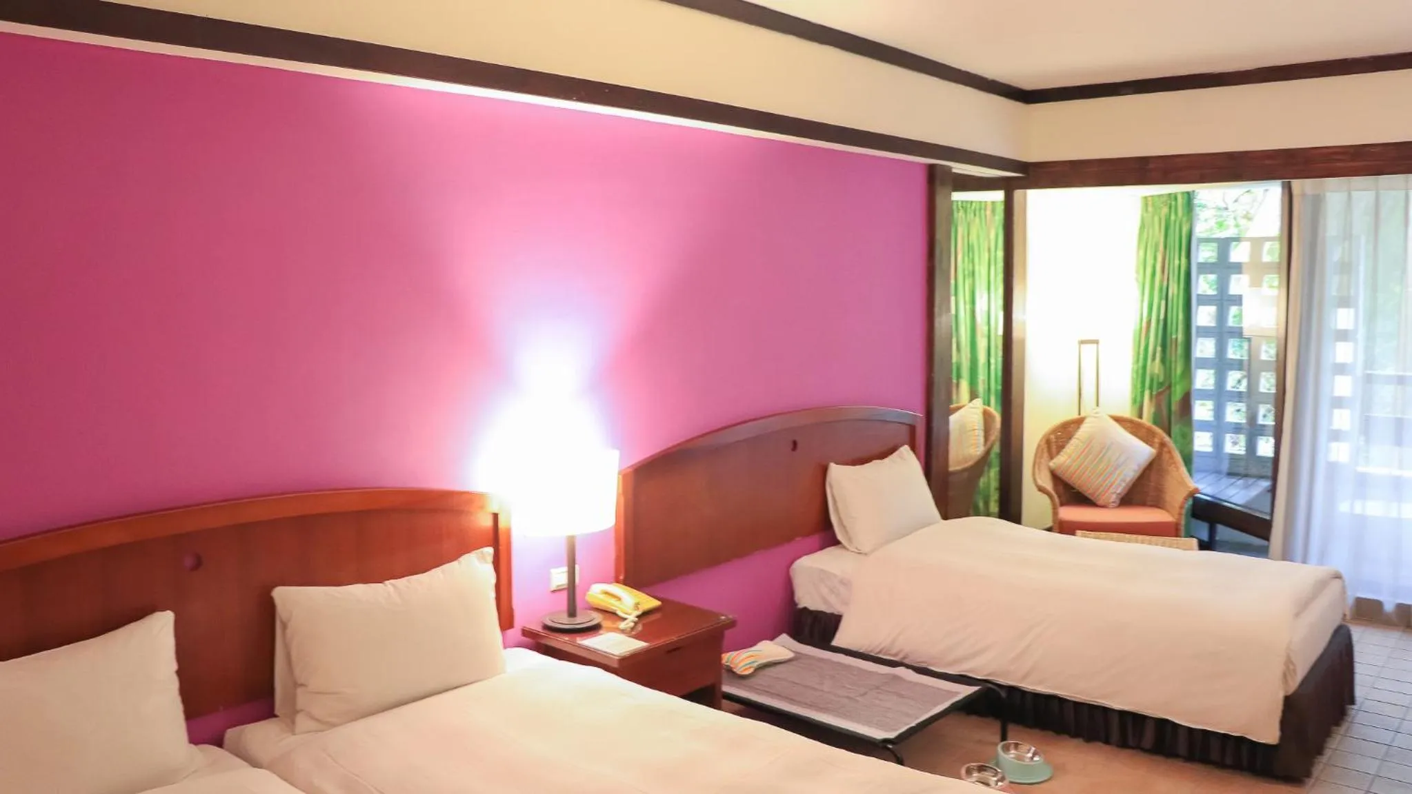 Photo of the whole room, Bed in Yoho Beach Resort Kenting