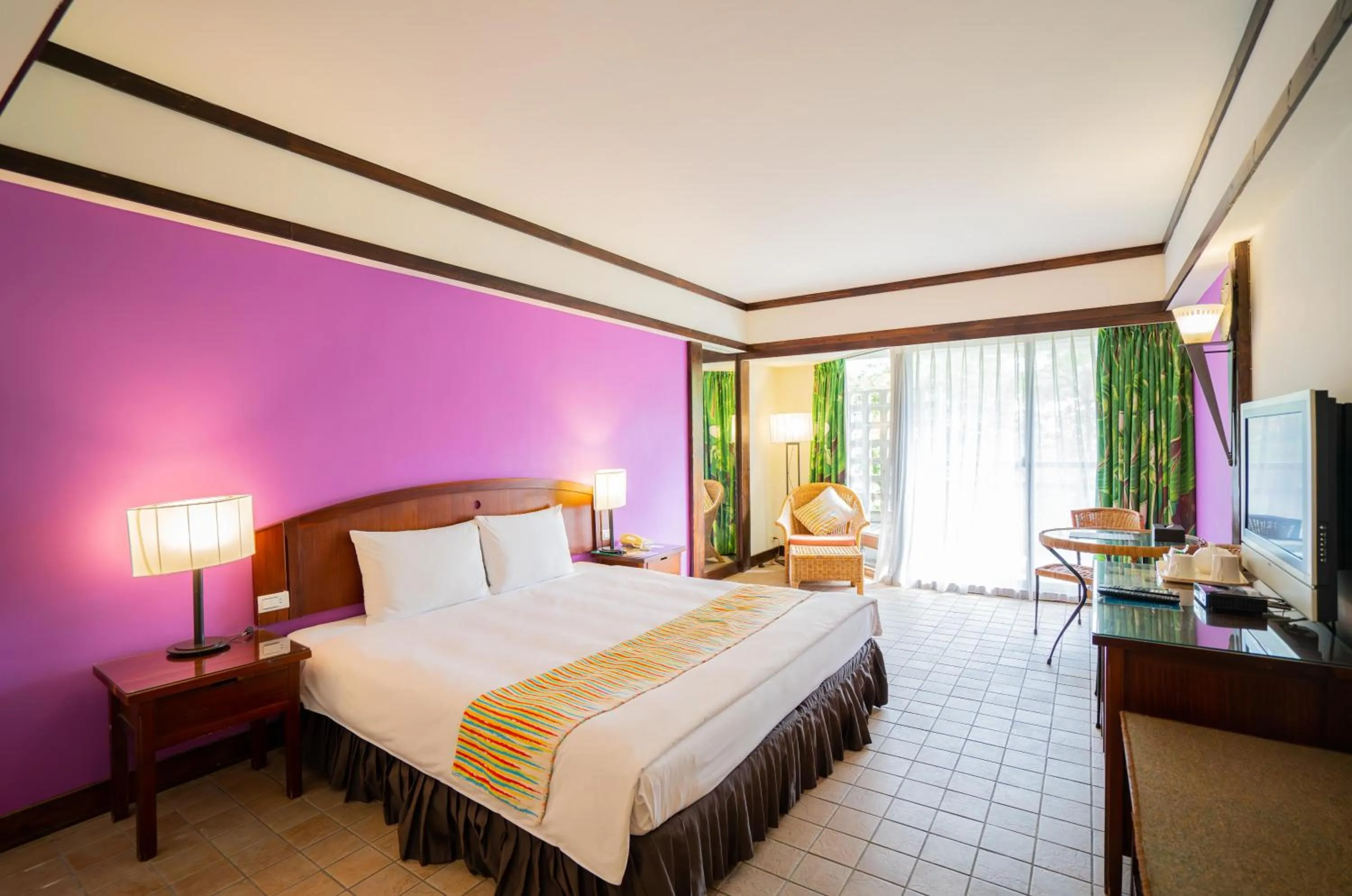 Photo of the whole room, Bed in Yoho Beach Resort Kenting