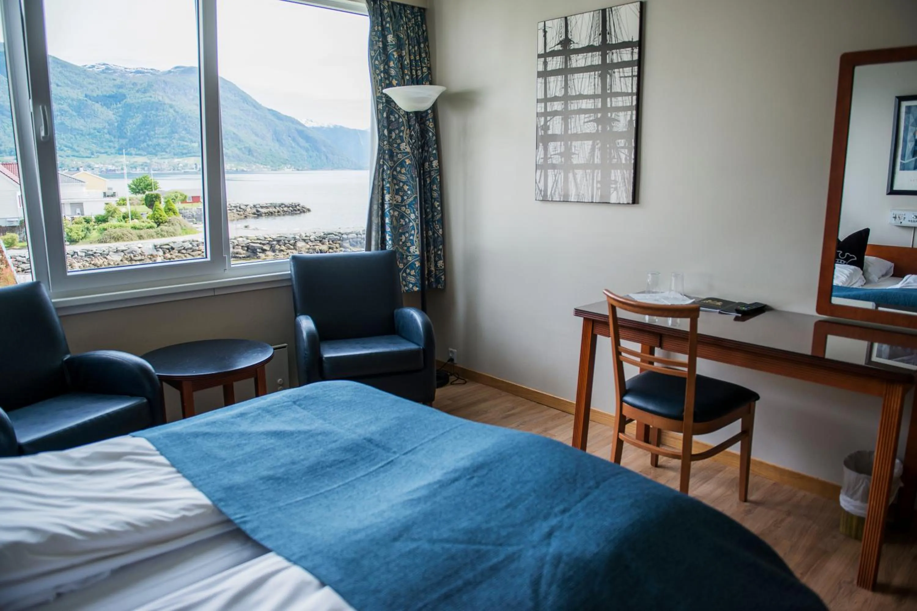 Photo of the whole room, Bed in Leikanger Fjordhotel - Unike Hoteller