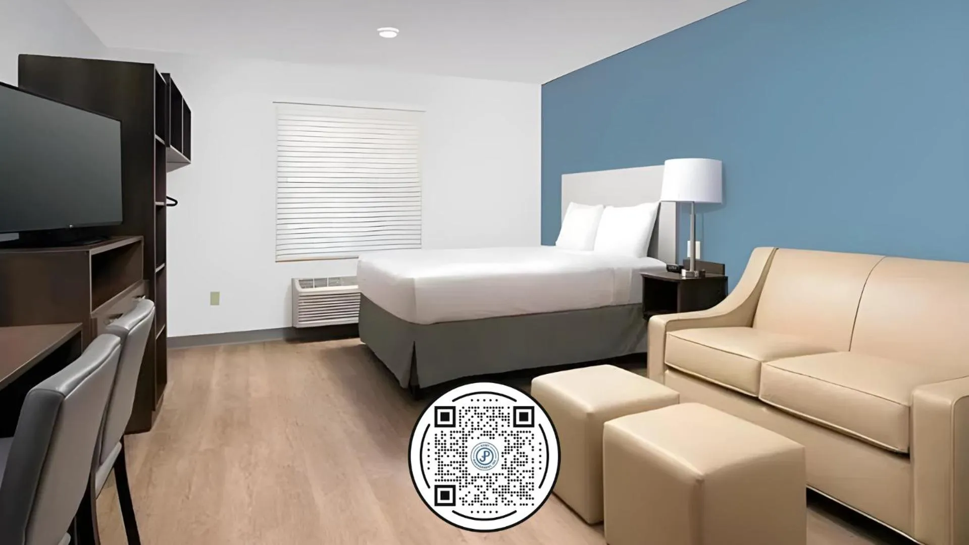 Bedroom in WoodSpring Suites Houston 288 South Medical Center