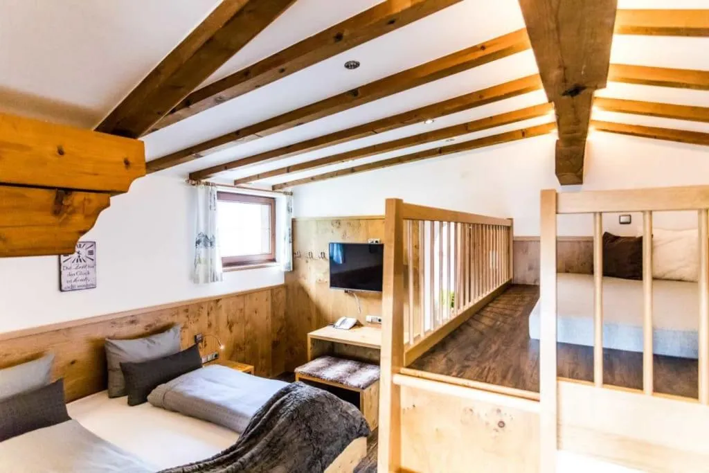 Bed in ALPENHOTEL TYROL - B&B - ADULTS ONLY - Alpines Lifestylehotel - BIO & Nachhaltig