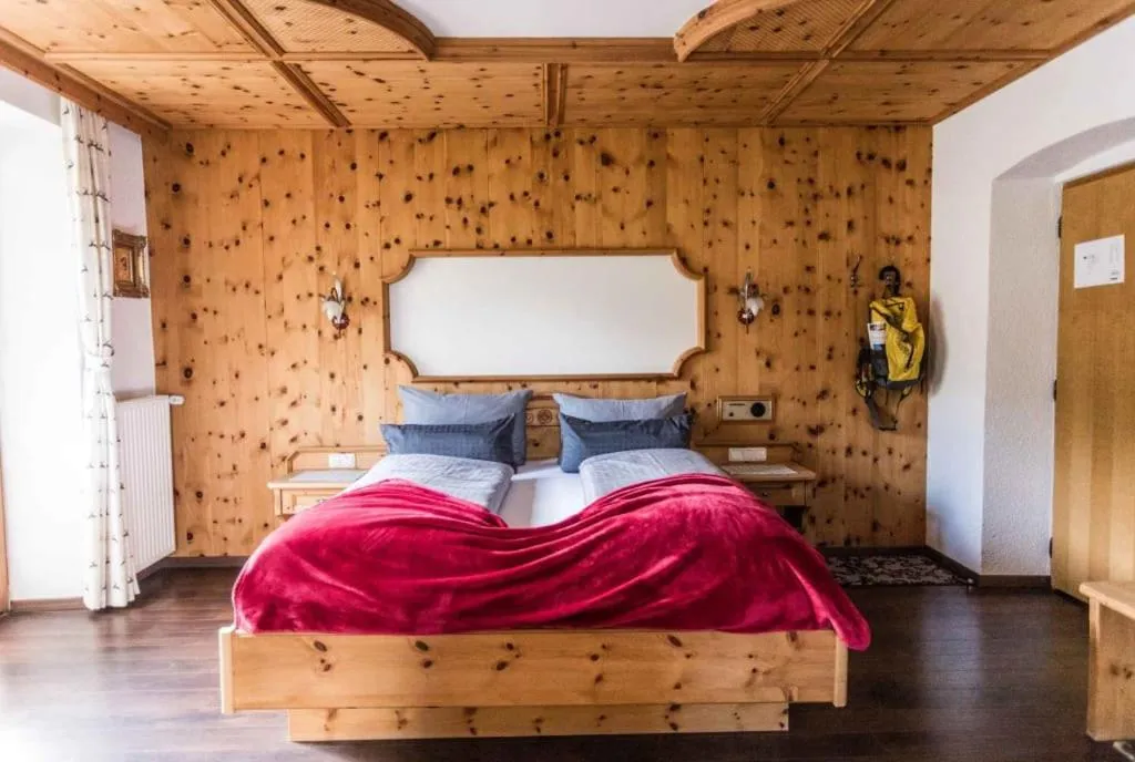Bed in ALPENHOTEL TYROL - B&B - ADULTS ONLY - Alpines Lifestylehotel - BIO & Nachhaltig