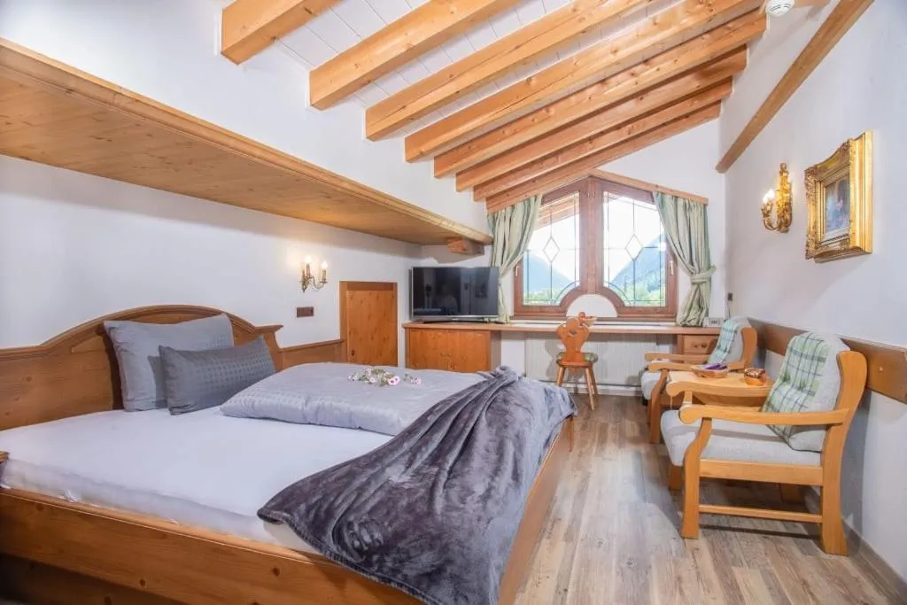 Bed in ALPENHOTEL TYROL - B&B - ADULTS ONLY - Alpines Lifestylehotel - BIO & Nachhaltig