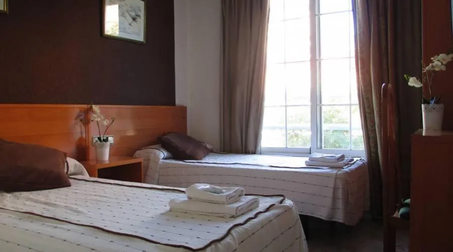 Bed in Hotel New Sanz