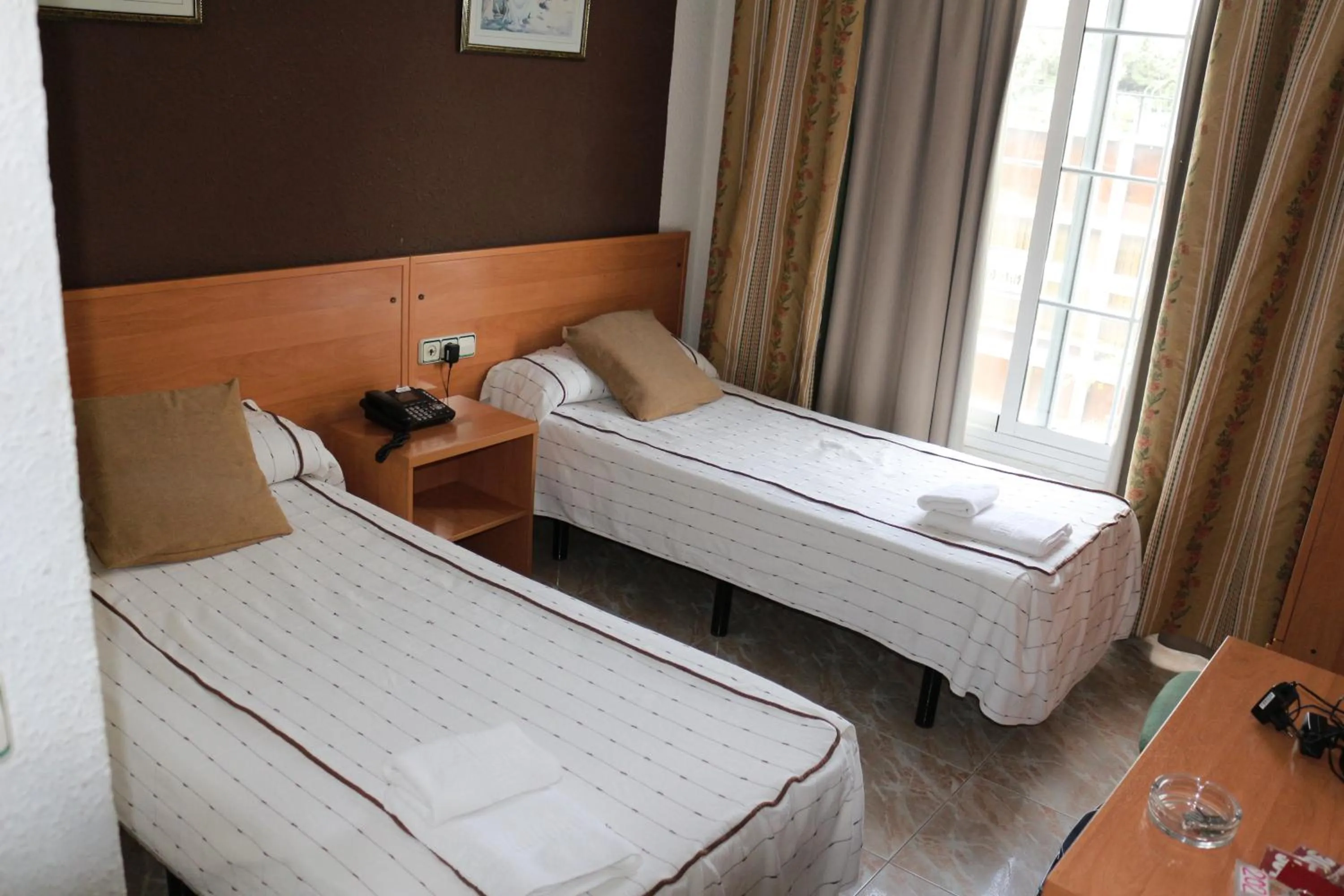 Bed in Hotel New Sanz