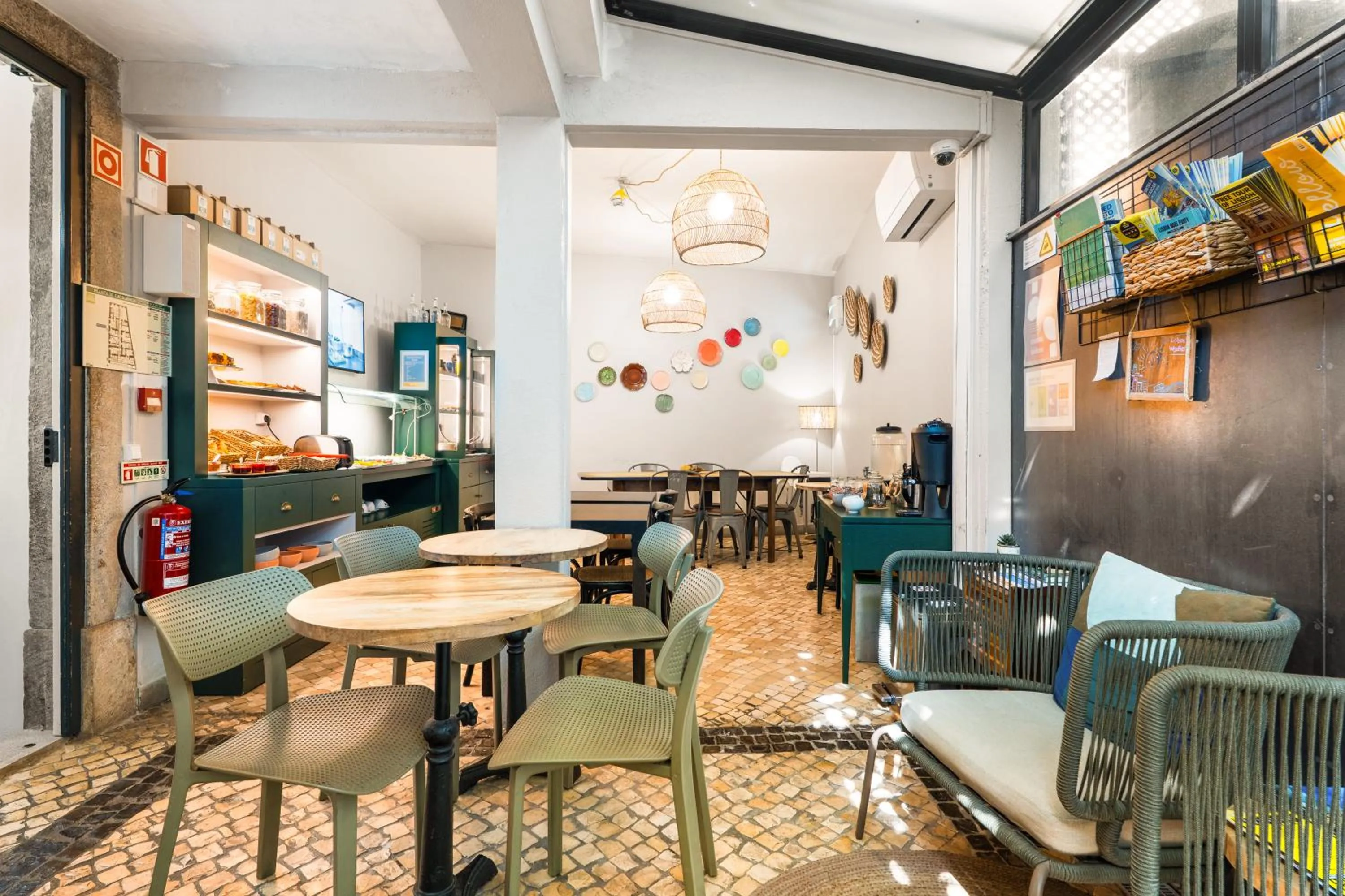Seating area in Casa do Bairro by Shiadu