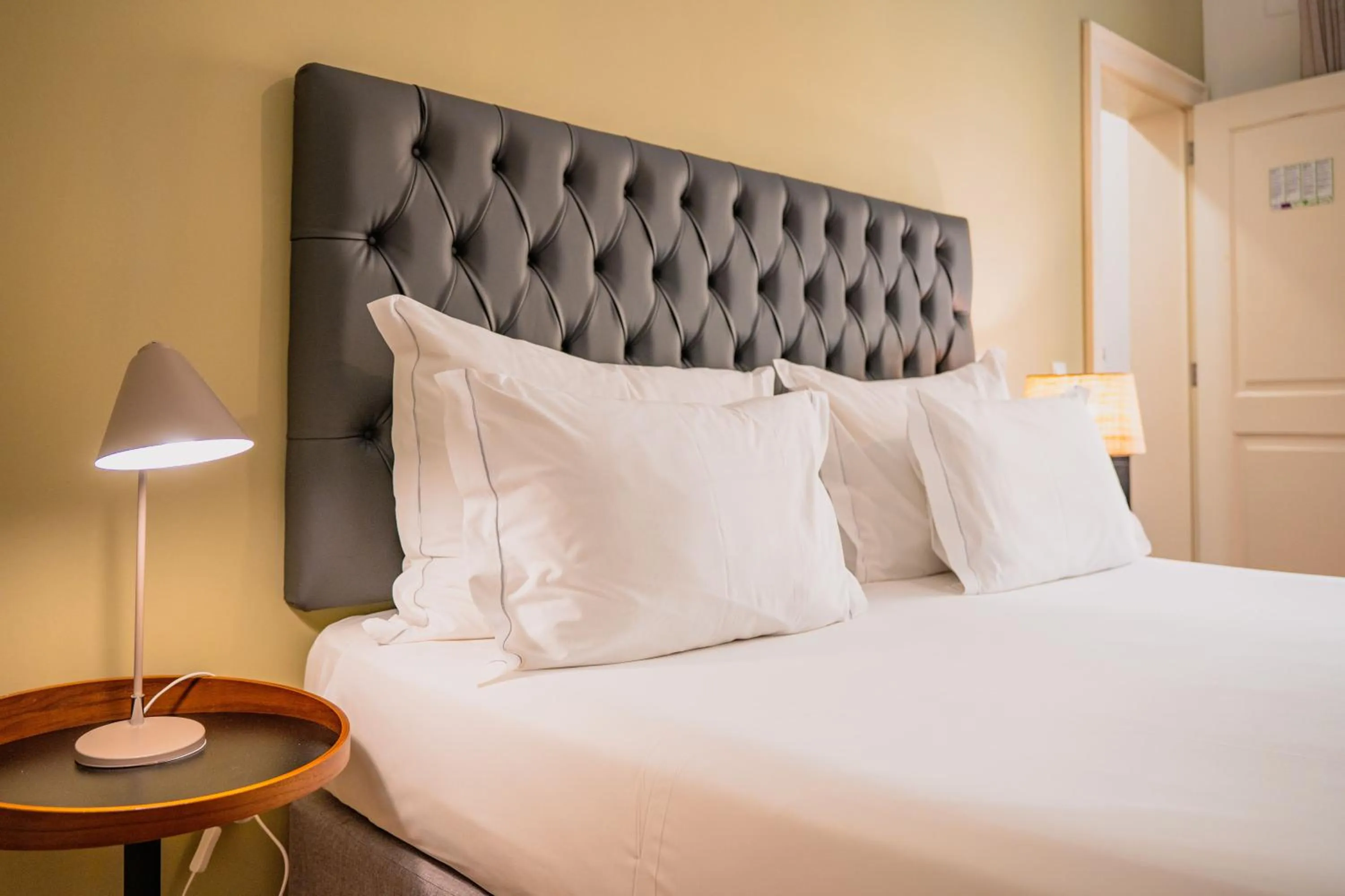 Bed in Casa do Bairro by Shiadu