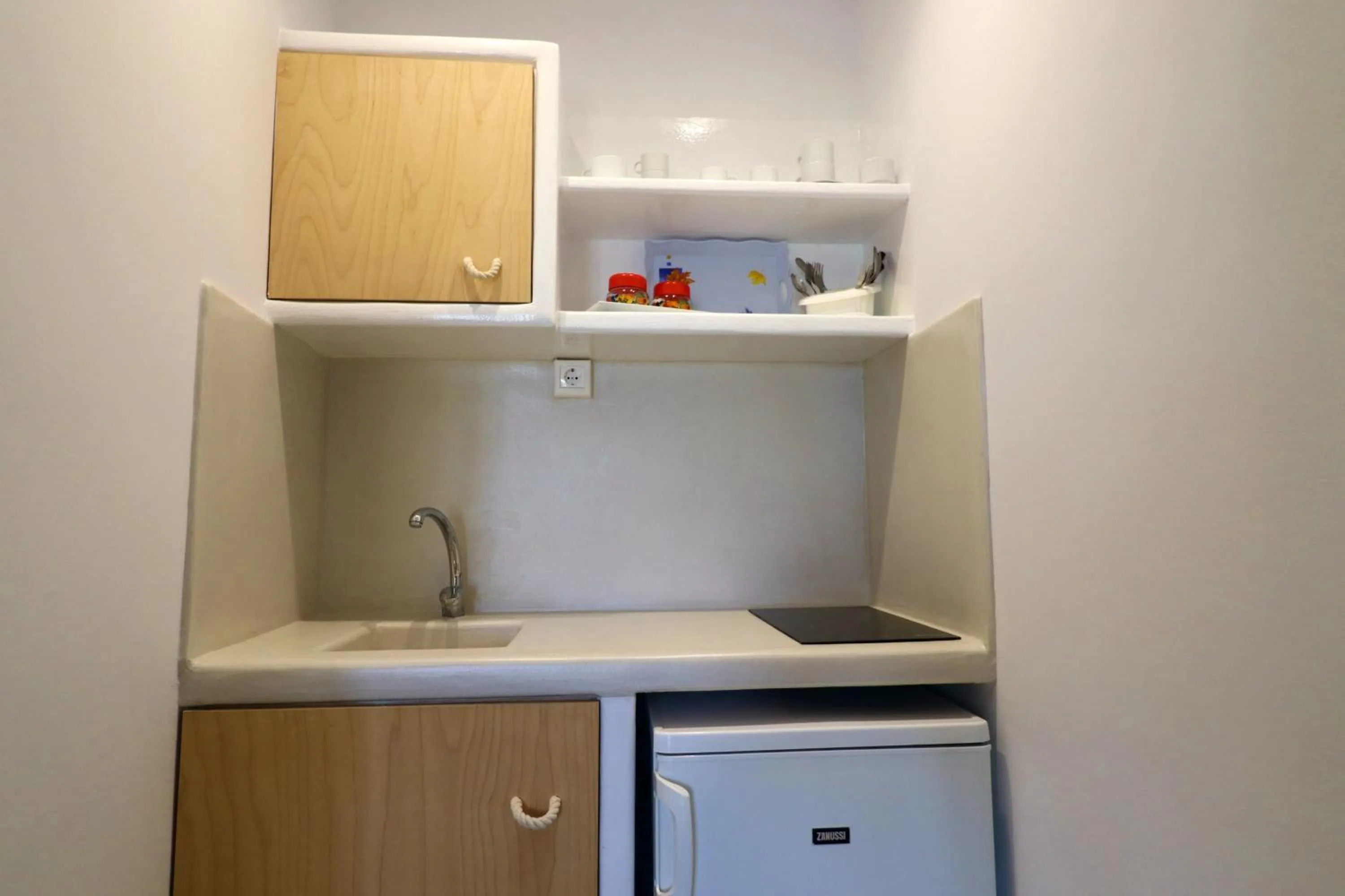 Kitchen or kitchenette in Coralli Beach Apartments
