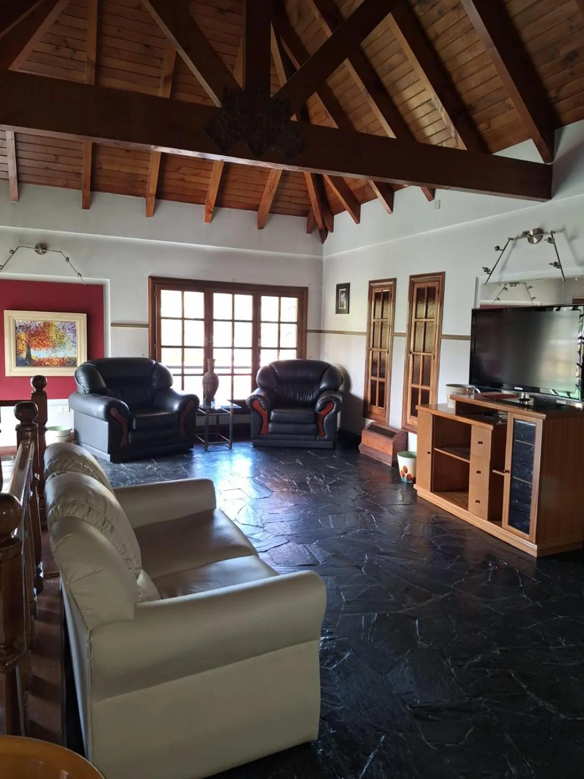 Communal lounge/ TV room in Hosteria Amparo