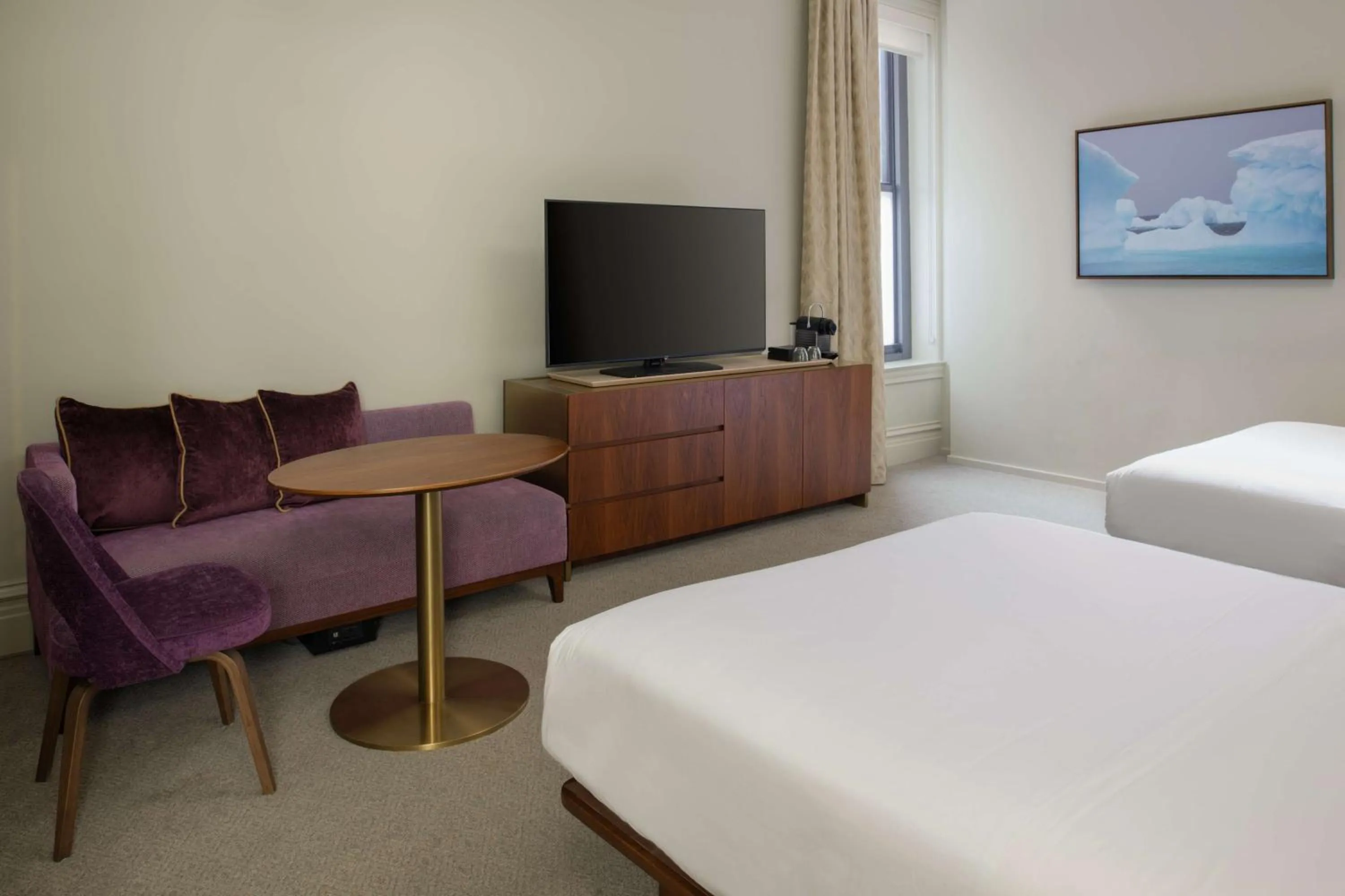 Living room, Bed in Hotel Savoy Kansas City, Tapestry Collection by Hilton