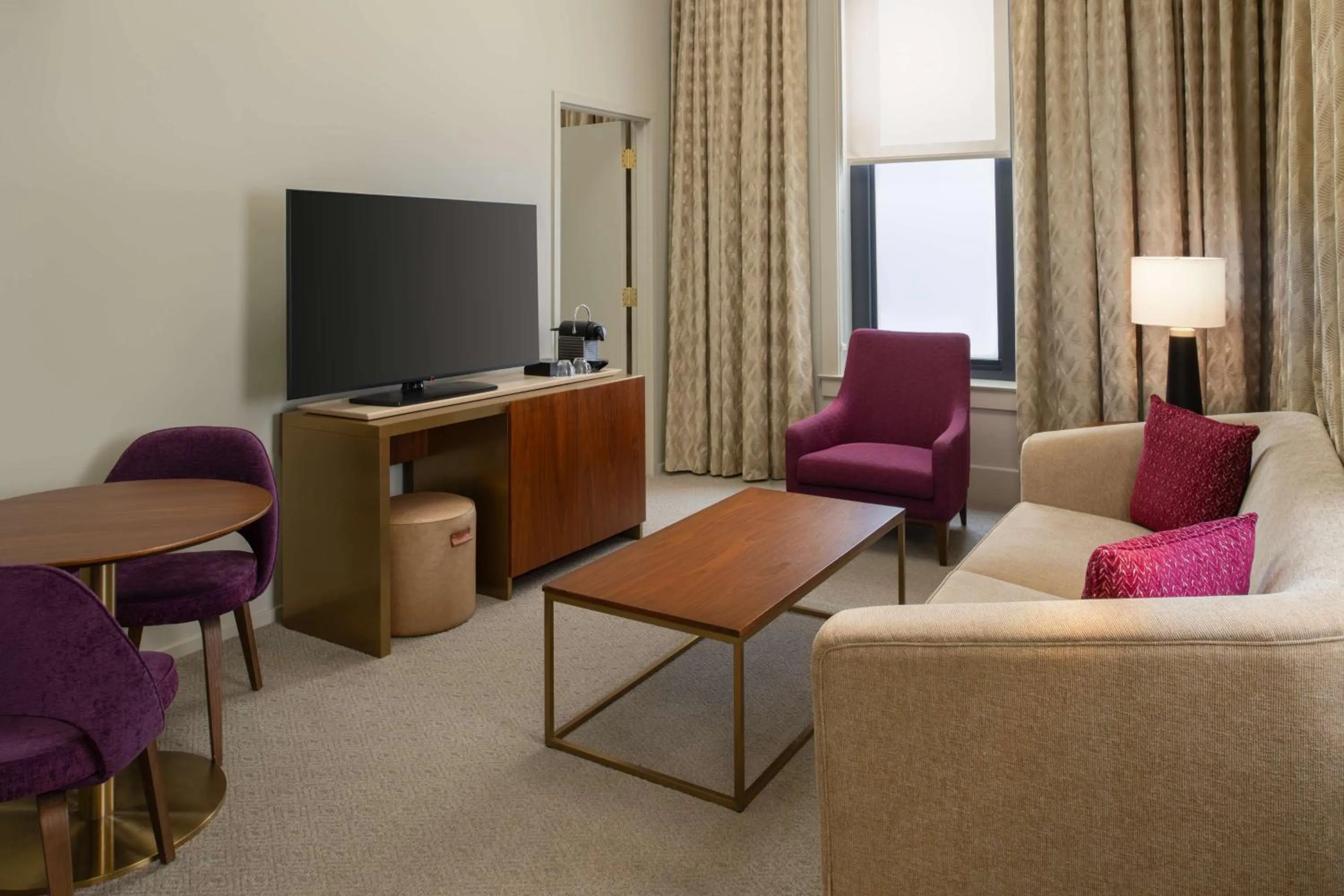 Living room in Hotel Savoy Kansas City, Tapestry Collection by Hilton