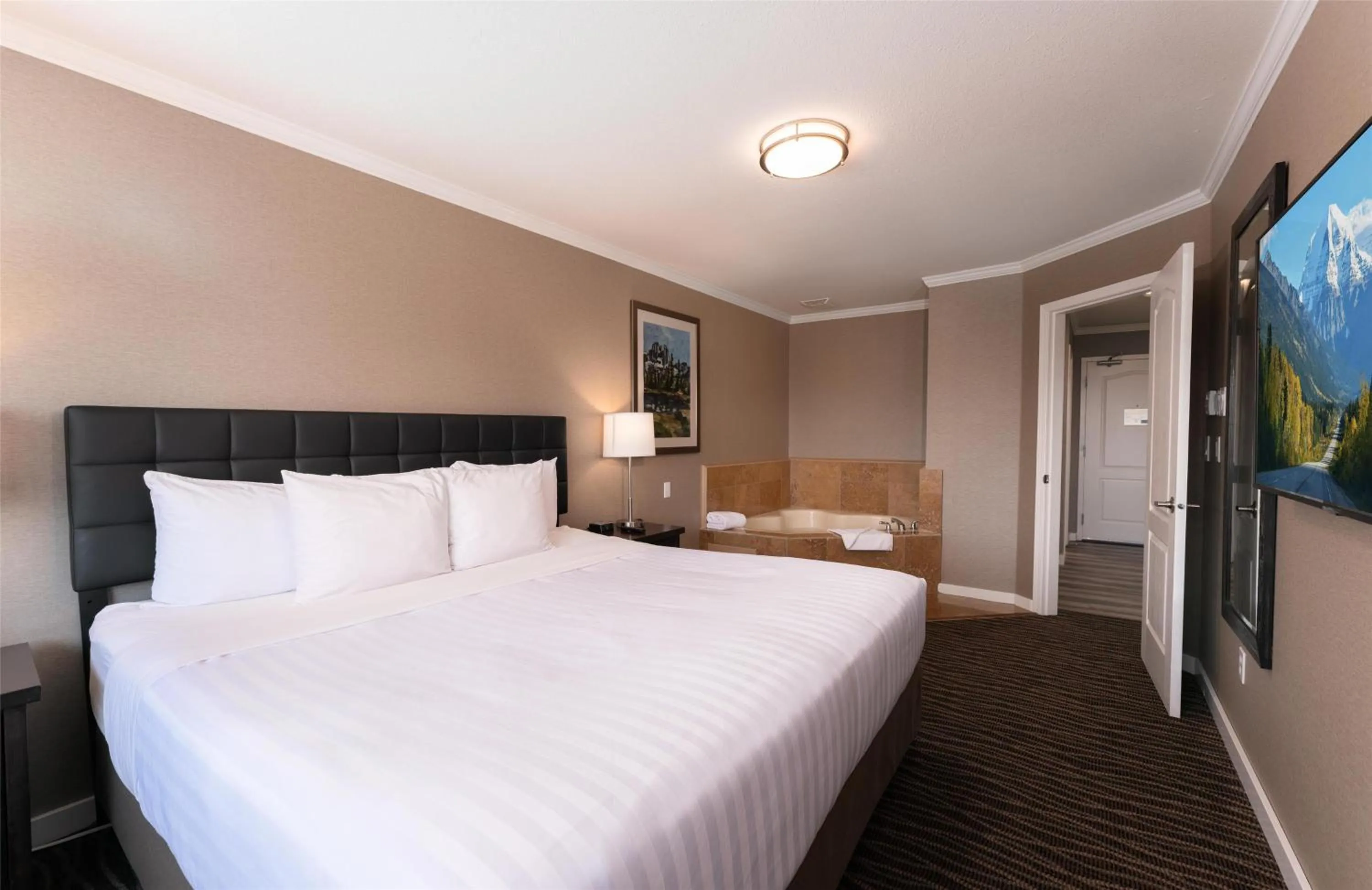 Bedroom, Bed in Prestige Radium Hot Springs Resort, WorldHotels Crafted