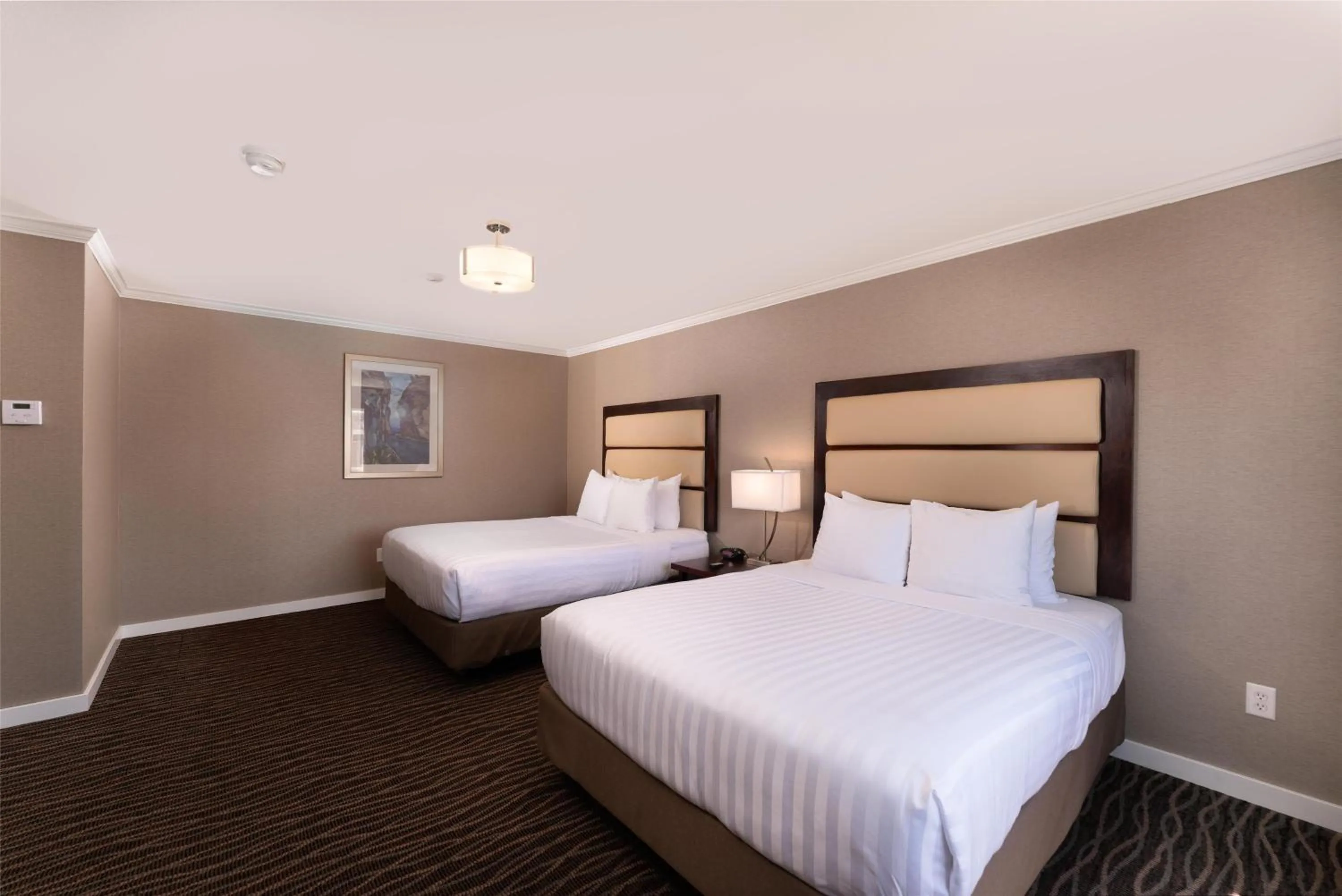 Bedroom, Bed in Prestige Radium Hot Springs Resort, WorldHotels Crafted