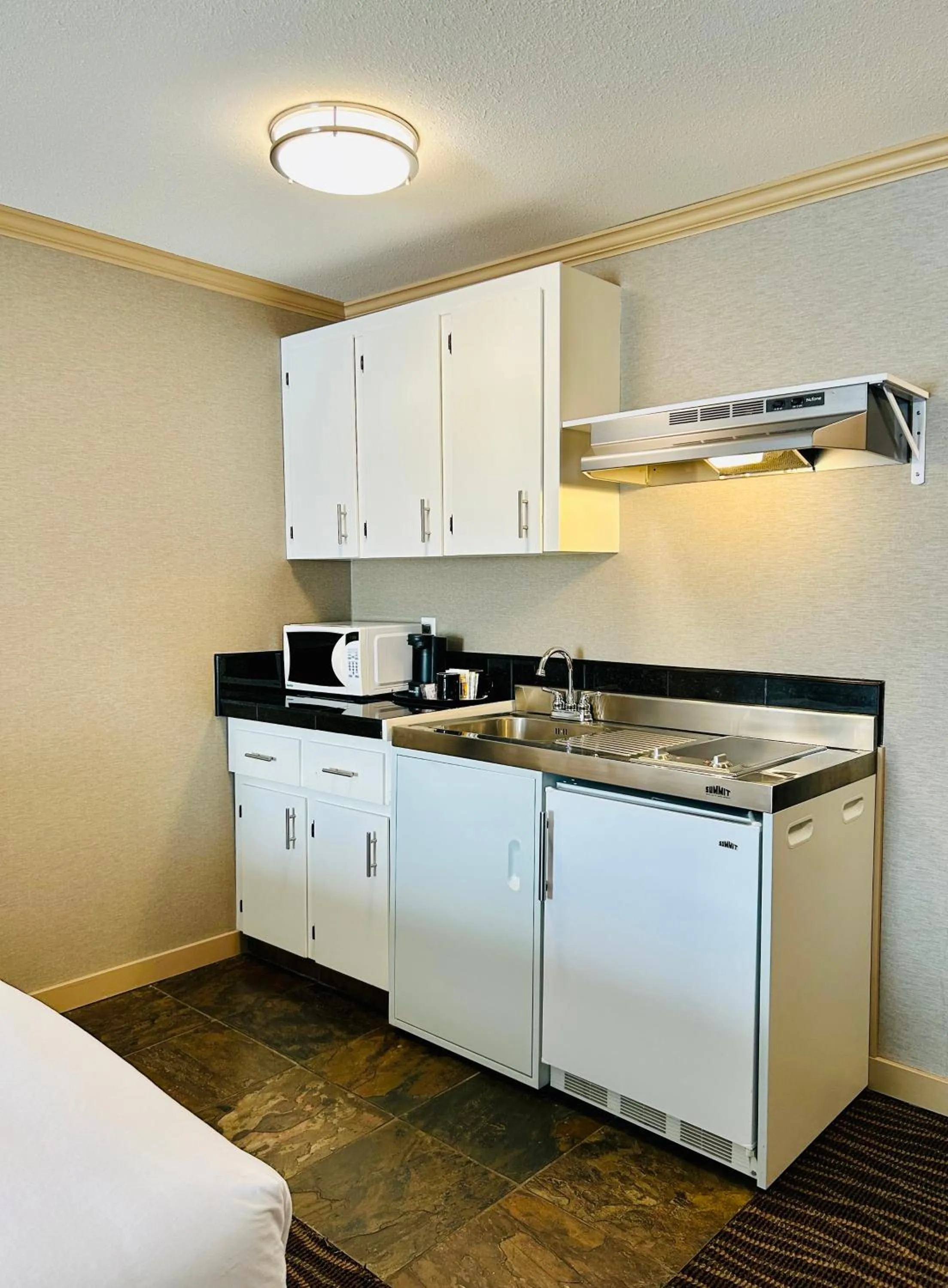 Kitchen or kitchenette in Prestige Radium Hot Springs Resort, WorldHotels Crafted