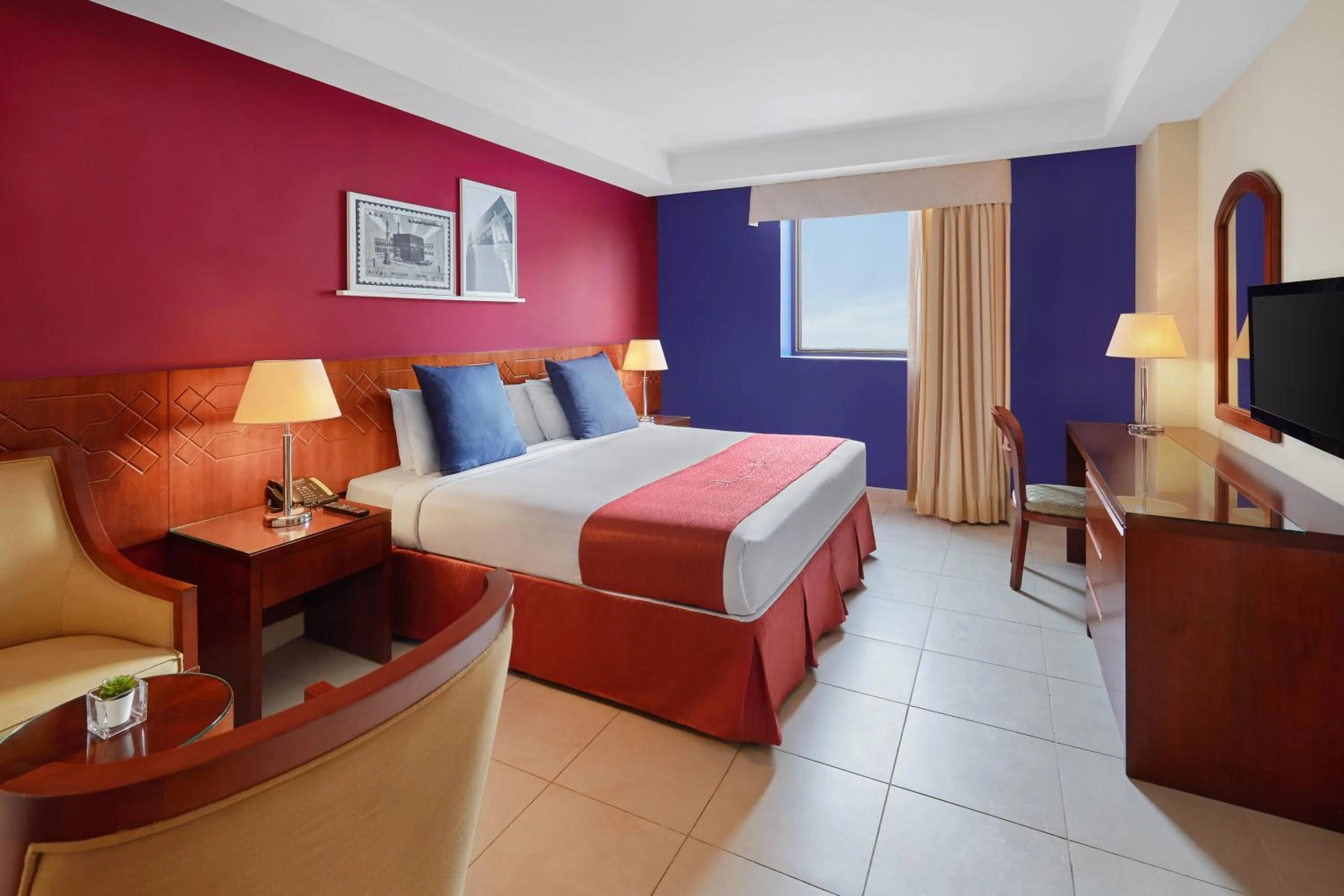 Seating area, Bed in Makarem Al Bait Al Azizia Hotel