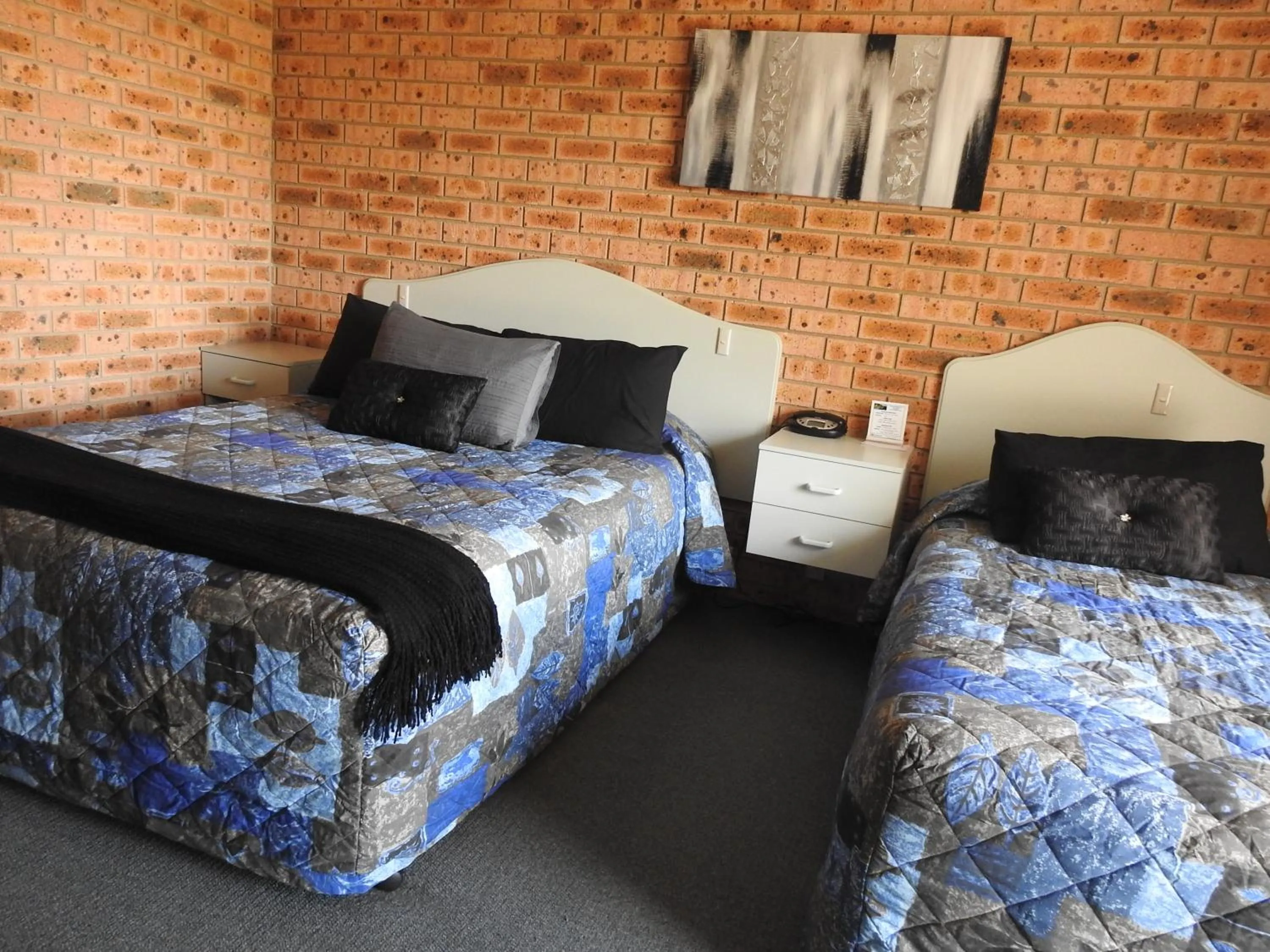 Bed in Big Trout Motel