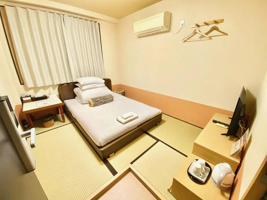 Photo of the whole room, Bed in GuestHouse017徳島個室 飲食街中心 阿波踊り会館7分 文理&徳島大学 アスティとくしま車8分